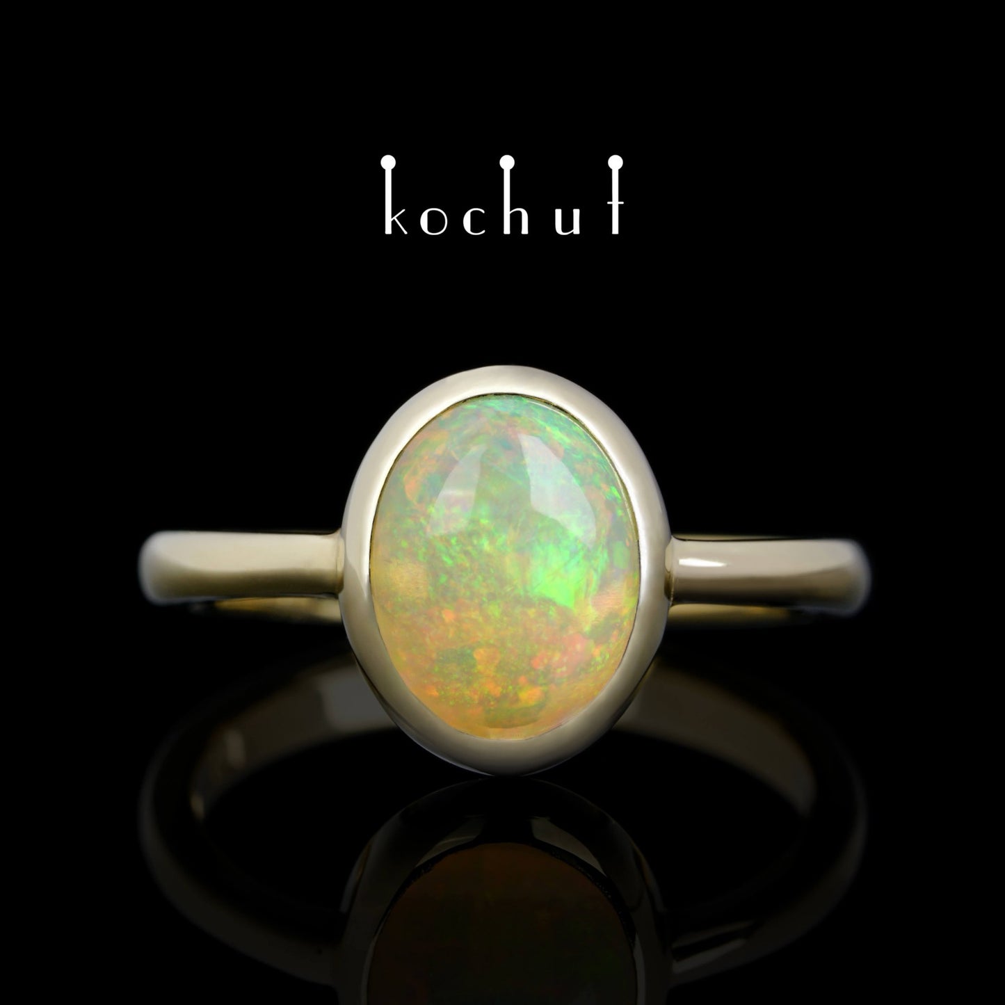 Der Glanz der Seele — Ring aus Gelbgold mit Opal
