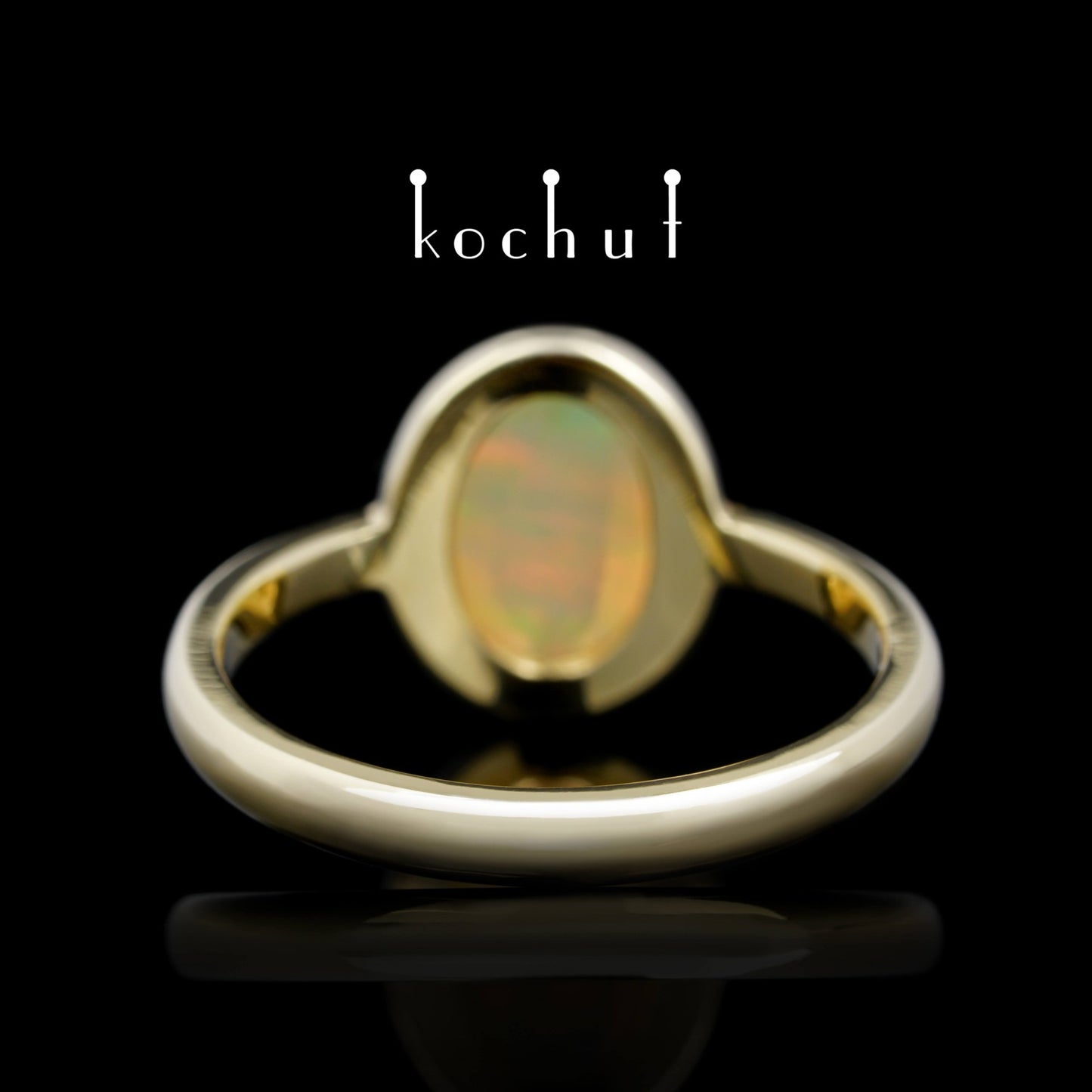 Der Glanz der Seele — Ring aus Gelbgold mit Opal