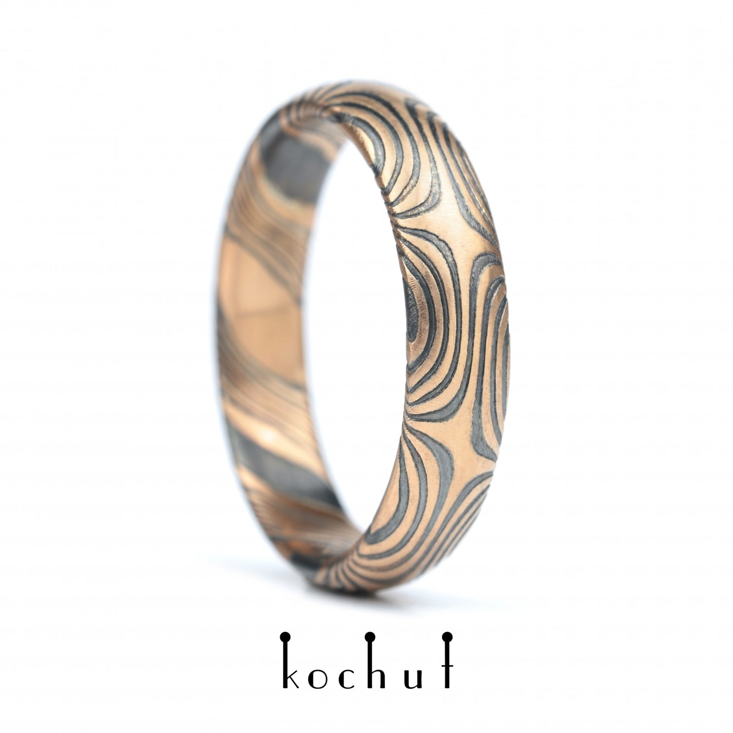 Orion — Mokume-Ehering aus Rotgold, graviert und oxidiertes Silber