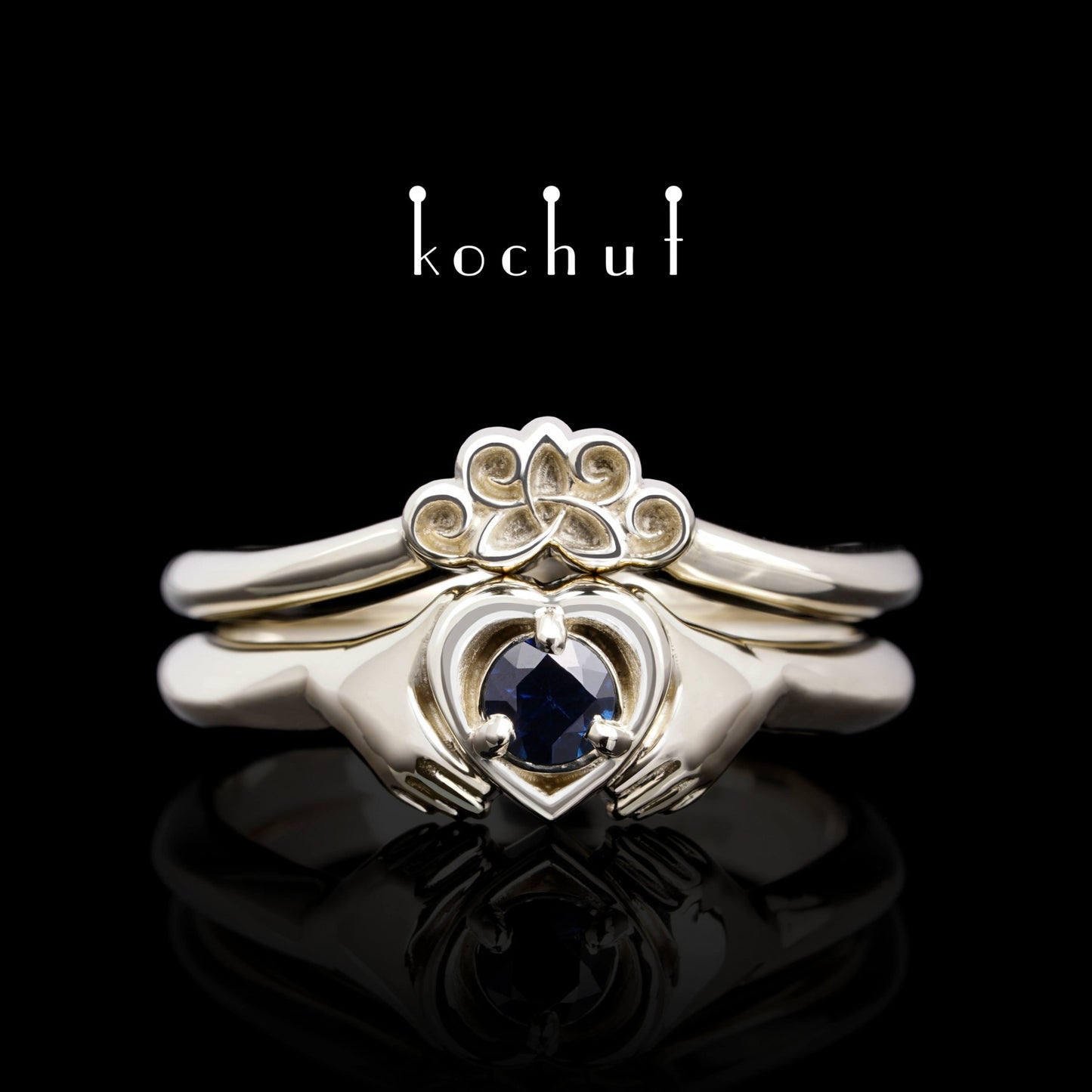 Claddagh: Doppelt — Ring aus Weißgold mit Saphir