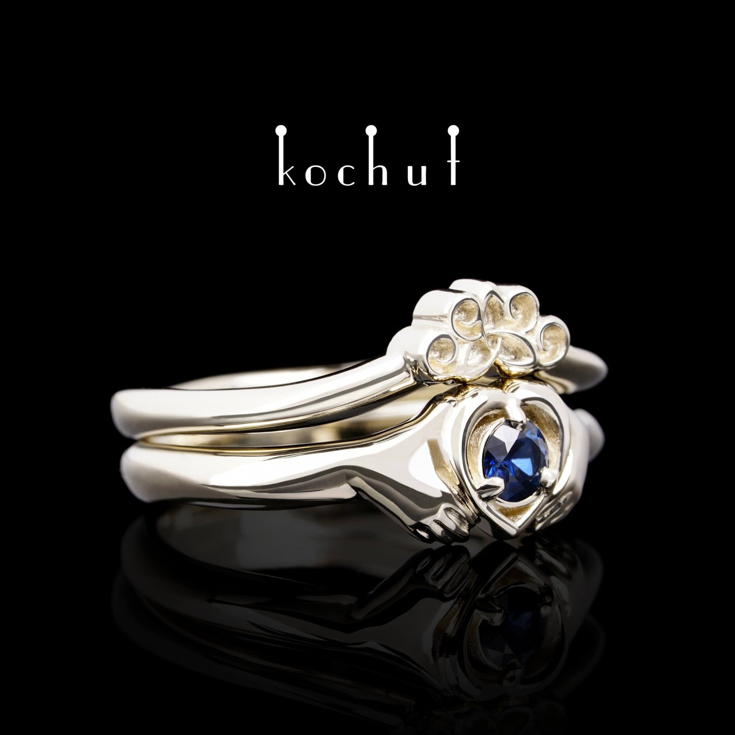 Claddagh: Doppelt — Ring aus Weißgold mit Saphir