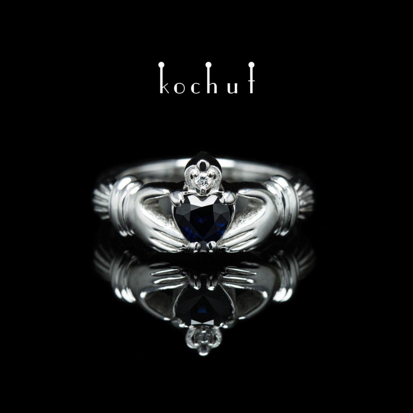 Claddagh: Liebe — Ring aus Weißgold mit Saphir und Diamant, beschichtet mit weißem Rhodium