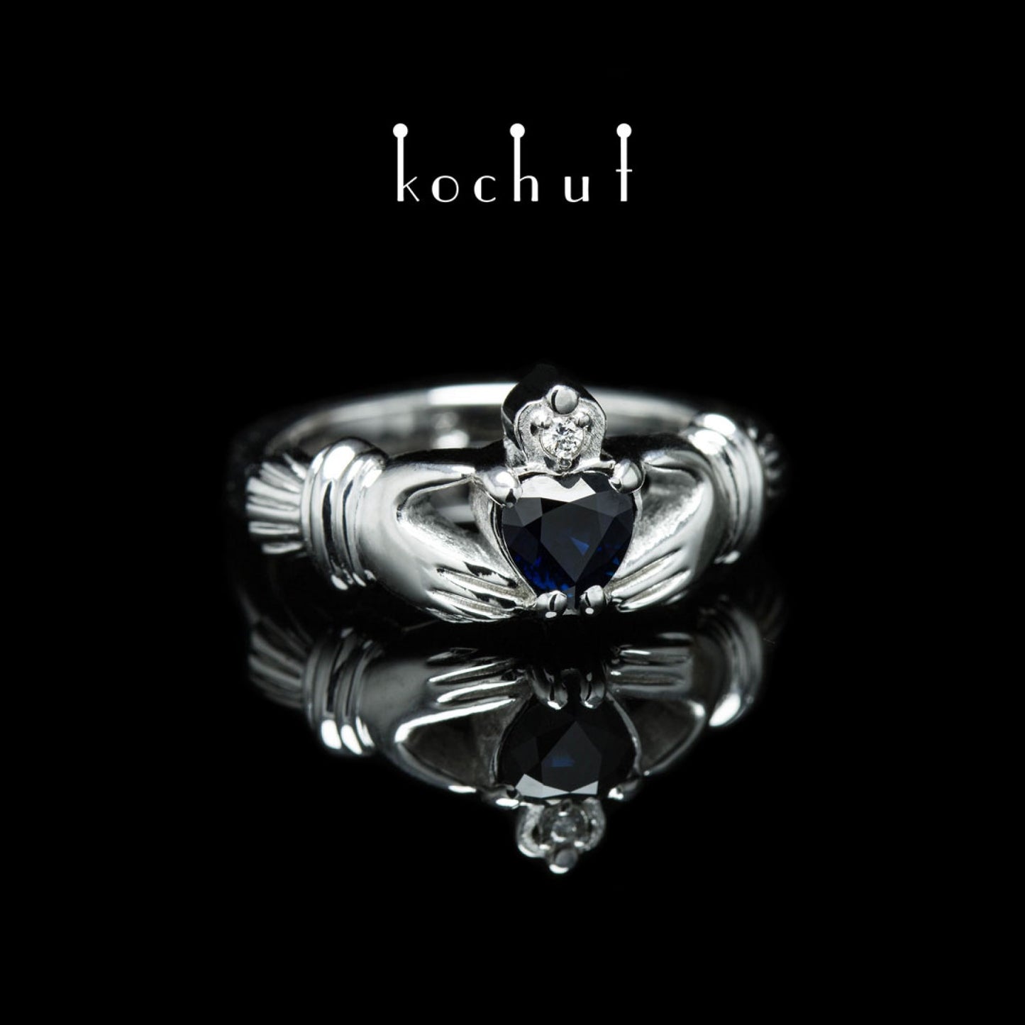 Claddagh: Liebe — Ring aus Weißgold mit Saphir und Diamant, beschichtet mit weißem Rhodium