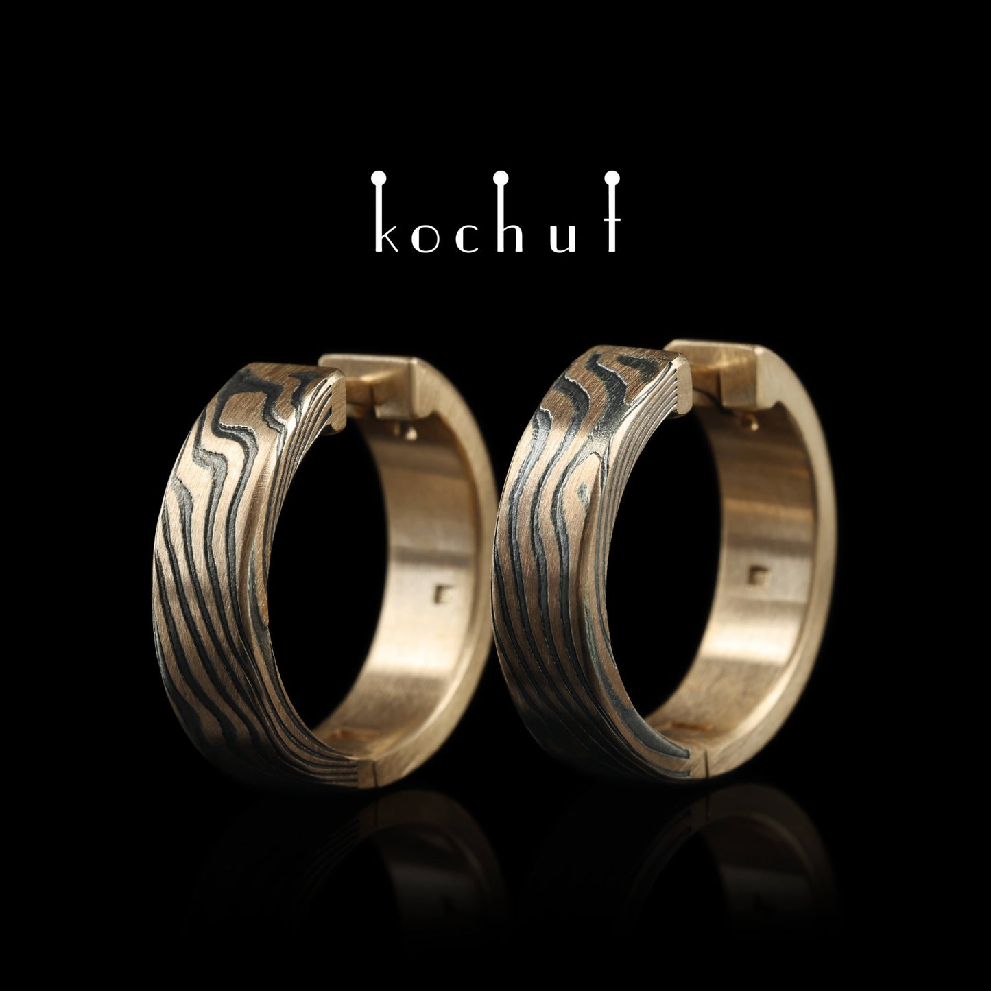 Yutori – Mokume-Ohrringe aus Rotgold, geätztem und oxidiertem Silber.