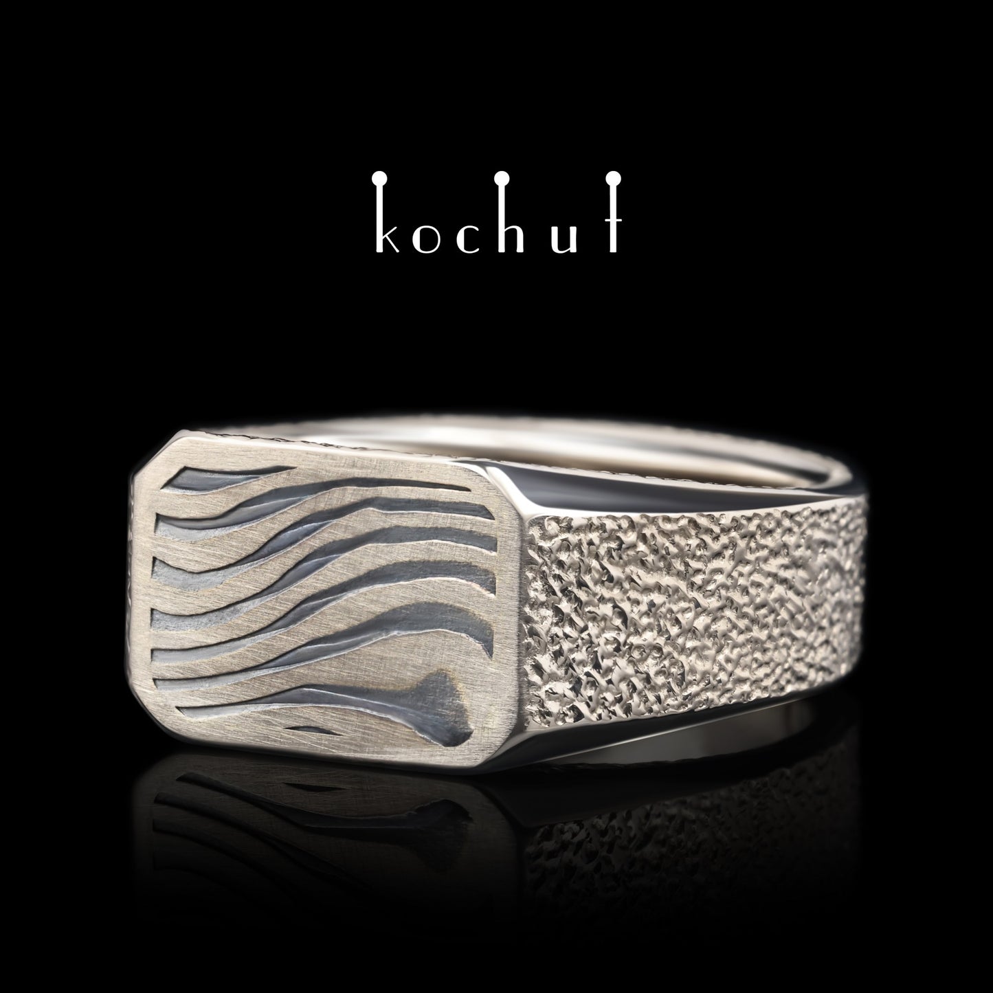 Kоgen – Mokume-Ring aus Palladiumgold, oxidiertem und geätztem Silber