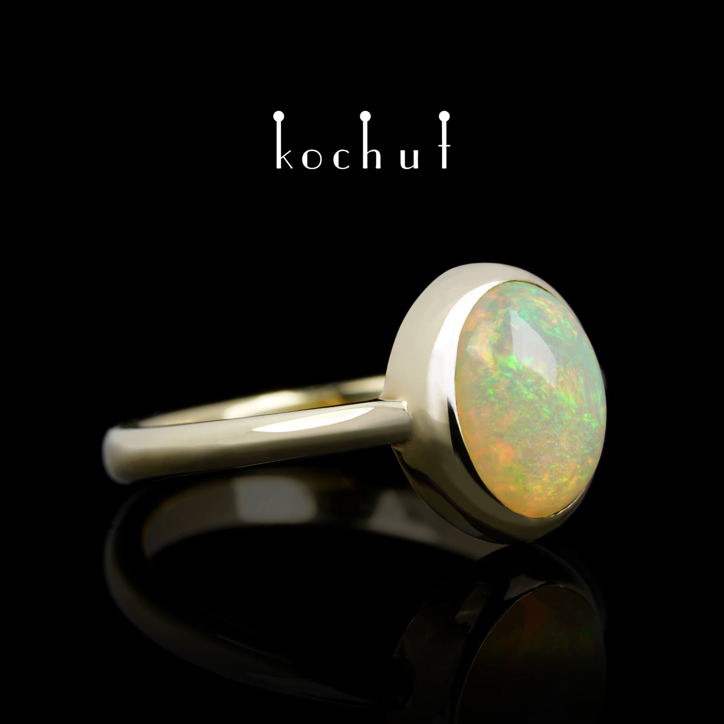 Der Glanz der Seele — Ring aus Gelbgold mit Opal