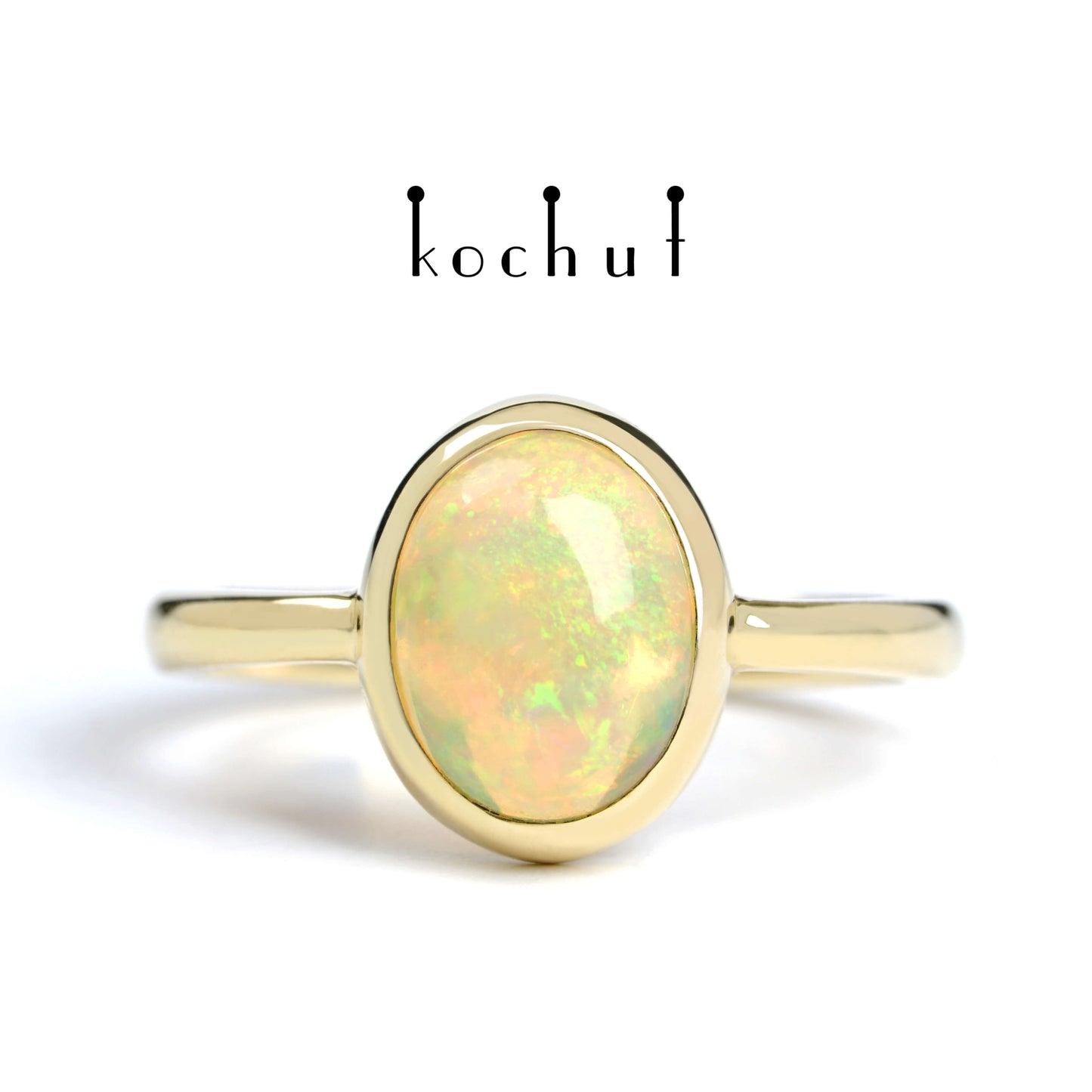 Der Glanz der Seele — Ring aus Gelbgold mit Opal
