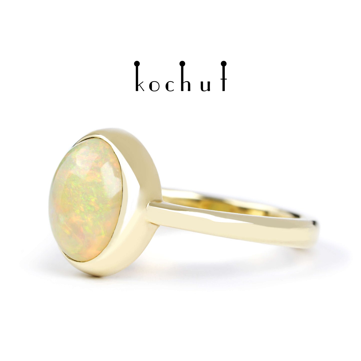 Der Glanz der Seele — Ring aus Gelbgold mit Opal