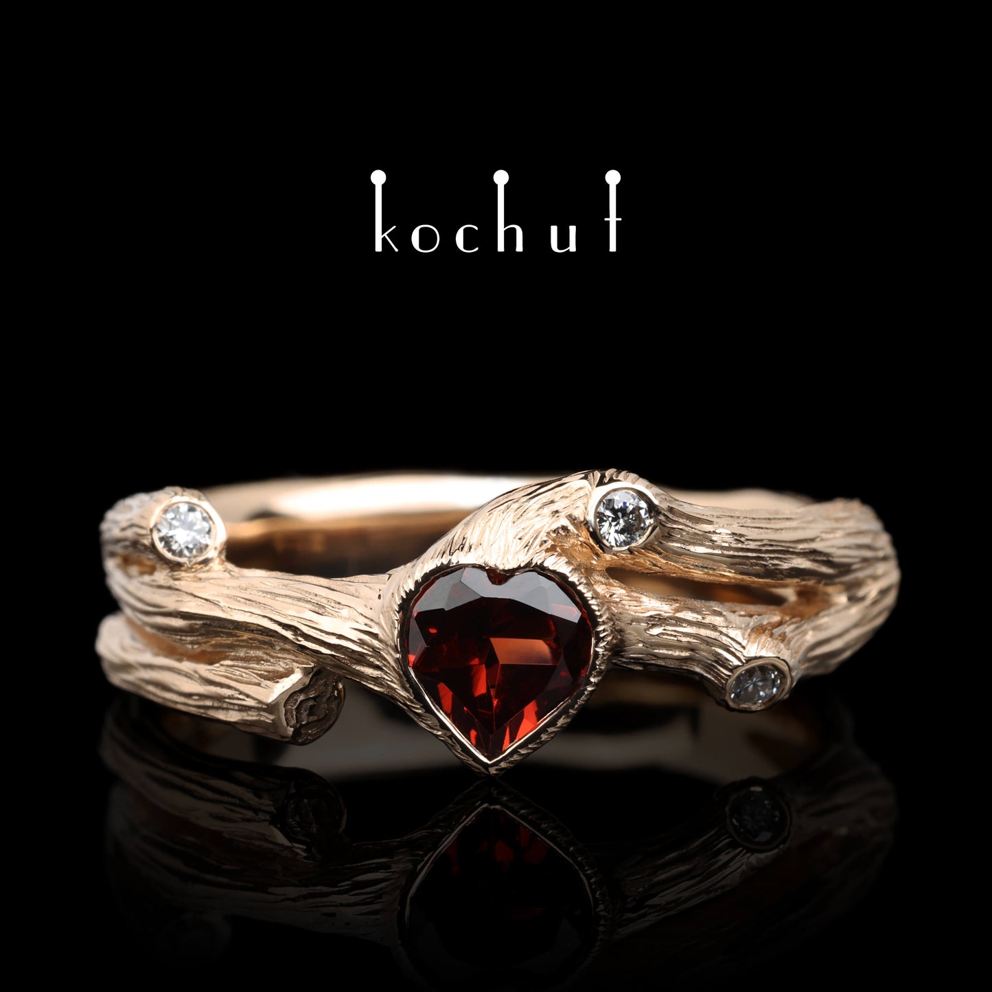 Herz des Waldes — Ring aus Rotgold mit Granat und Diamanten