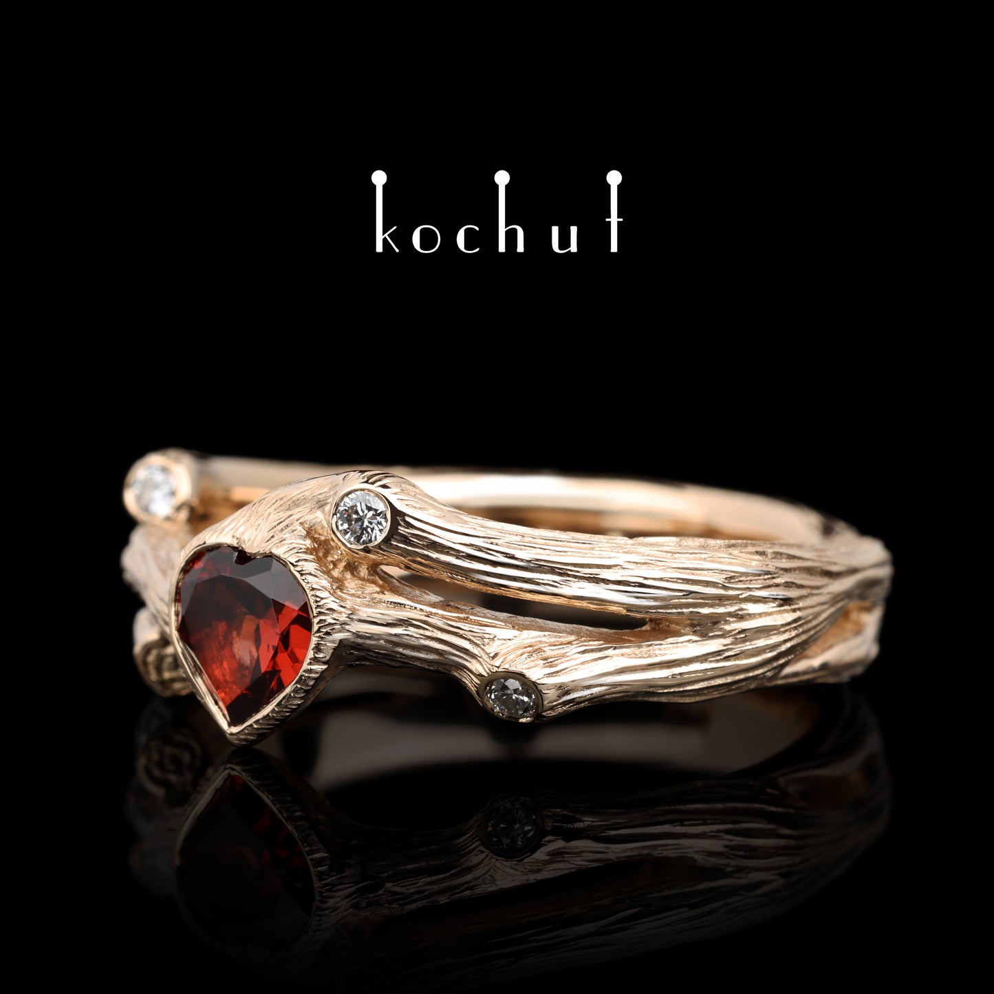 Herz des Waldes — Ring aus Rotgold mit Granat und Diamanten