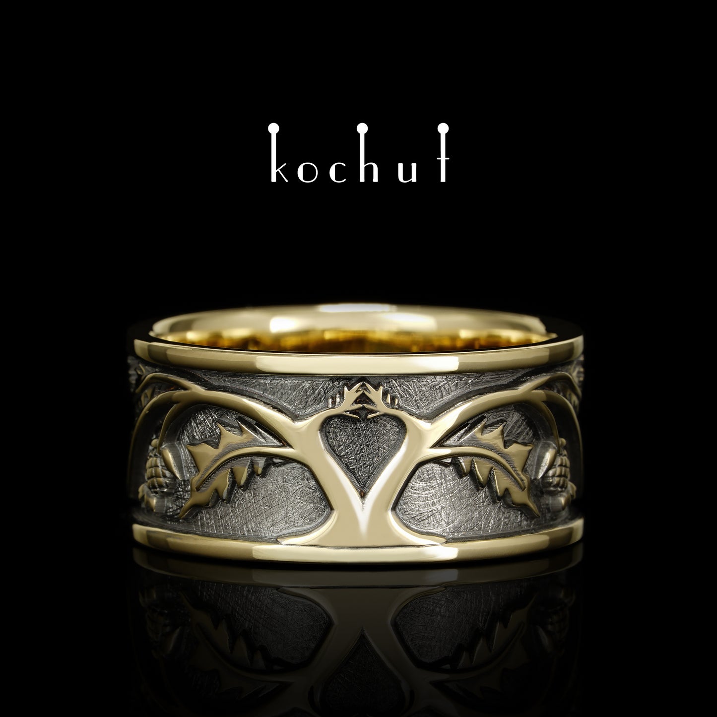 Alchemie der Liebe — Ehering aus Gelb- und Rotgold, überzogen mit schwarzem Rhodium