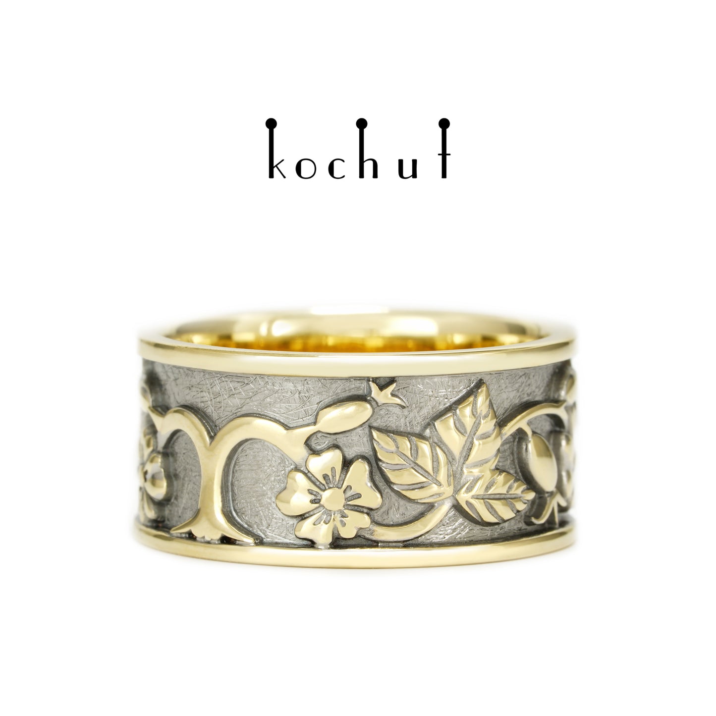 Alchemie der Liebe — Ehering aus Gelb- und Weißgold mit einem Saphir, überzogen mit schwarzem Rhodium
