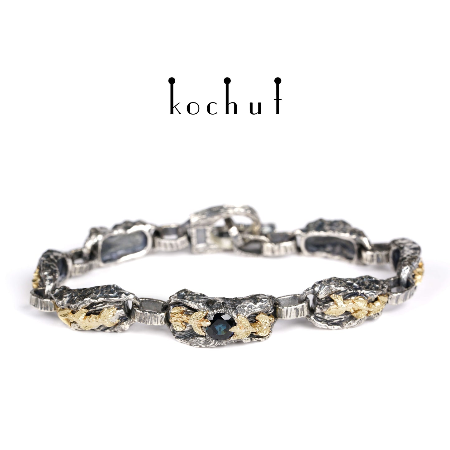 Kraft des Lebens — Armband aus oxidiertem Silber und Gelbgold mit Saphir