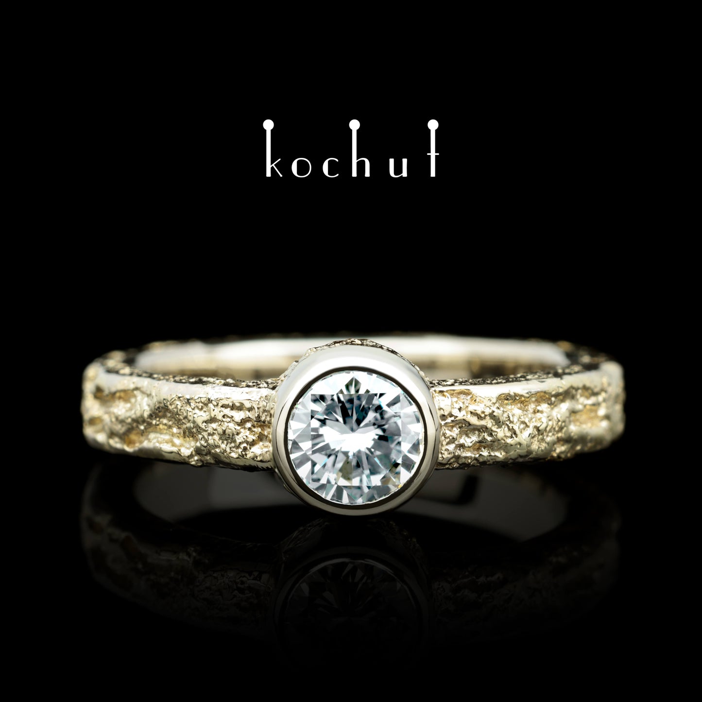 Leib und Seele — Verlobungsring aus Weiß- und Gelbgold mit Diamant