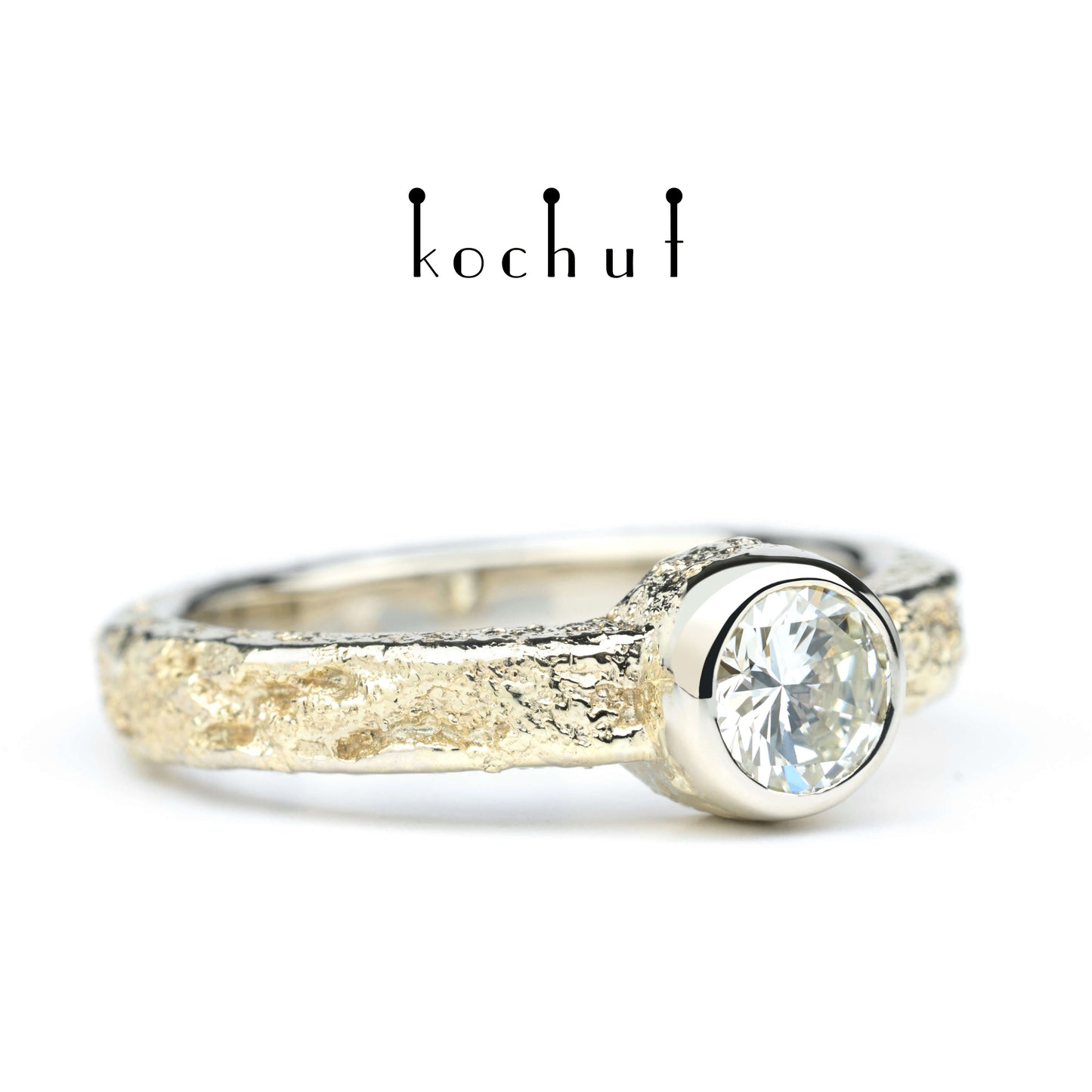 Leib und Seele — Verlobungsring aus Weiß- und Gelbgold mit Diamant