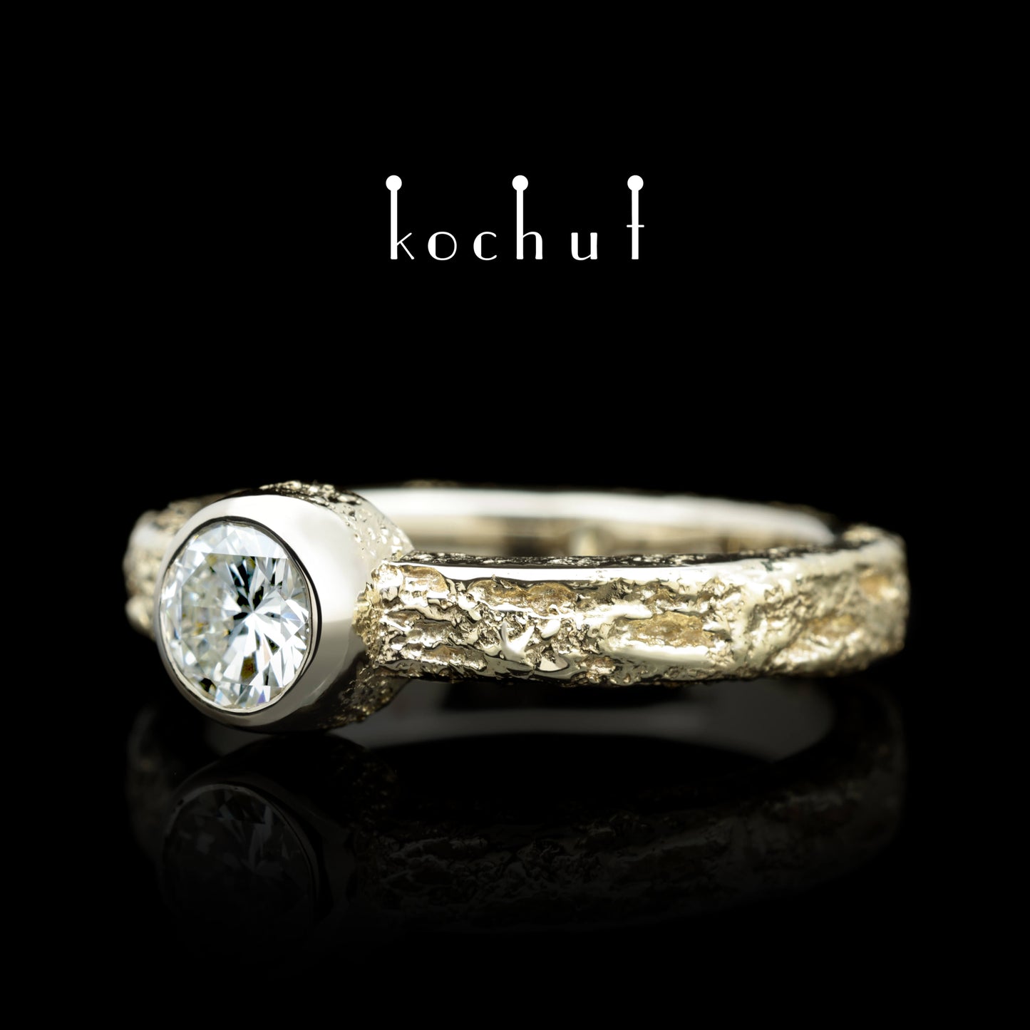 Leib und Seele — Verlobungsring aus Weiß- und Gelbgold mit Diamant