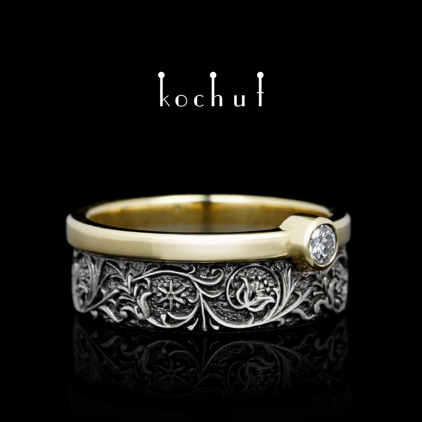 Harmonie der Natur — Ehering aus Silber und Gelbgold mit einem Diamanten, beschichtet mit schwarzem Rhodium