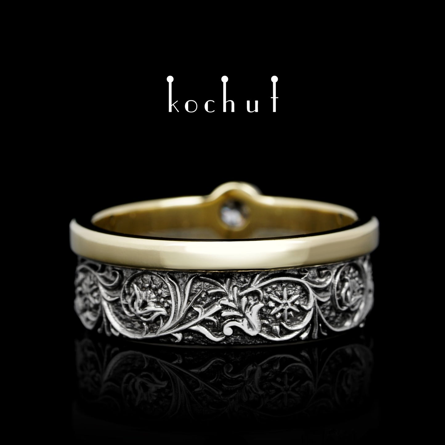 Harmonie der Natur — Ehering aus Silber und Gelbgold mit einem Diamanten, beschichtet mit schwarzem Rhodium