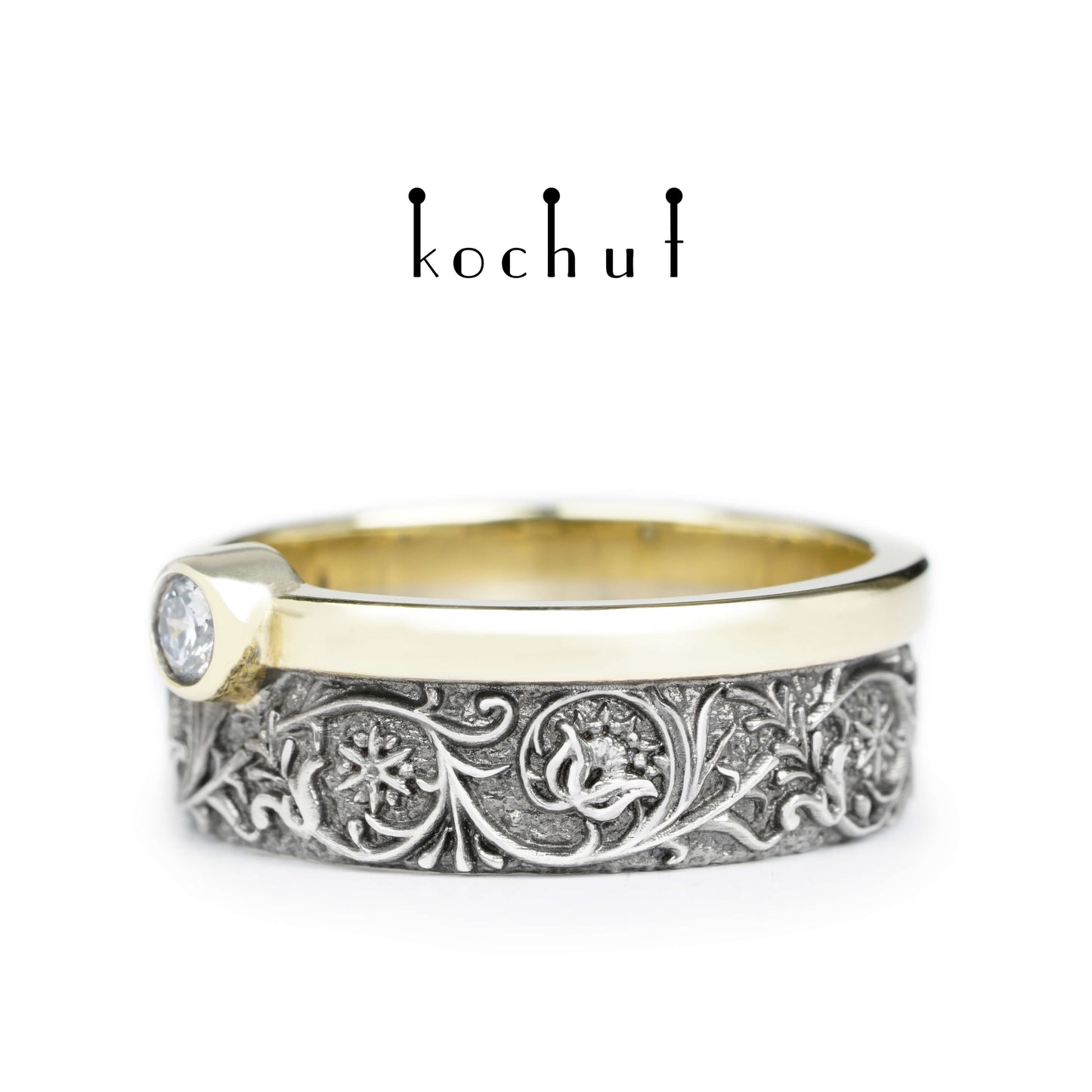 Harmonie der Natur — Ehering aus Silber und Gelbgold mit einem Diamanten, beschichtet mit schwarzem Rhodium