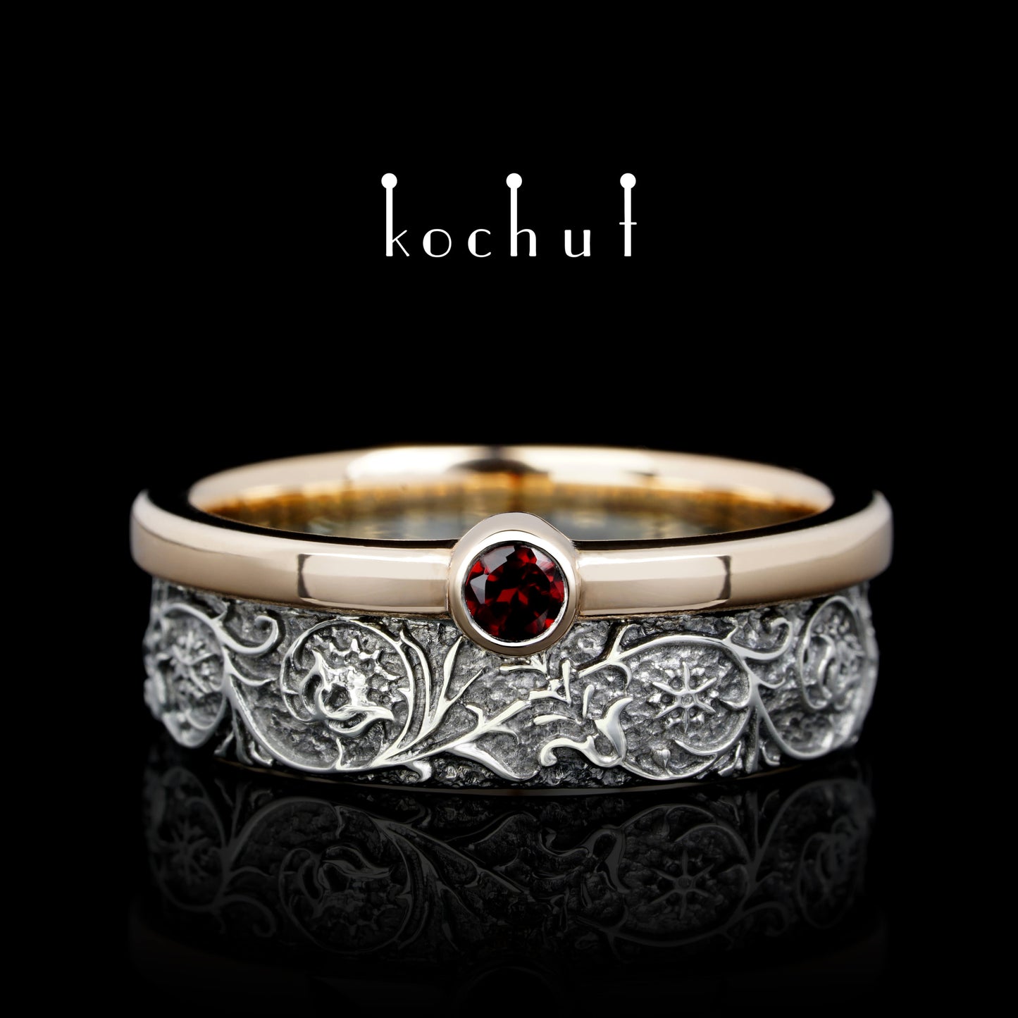 Harmonie der Natur — Ring aus Silber, Rotgold mit Granat, überzogen mit schwarzem Rhodium