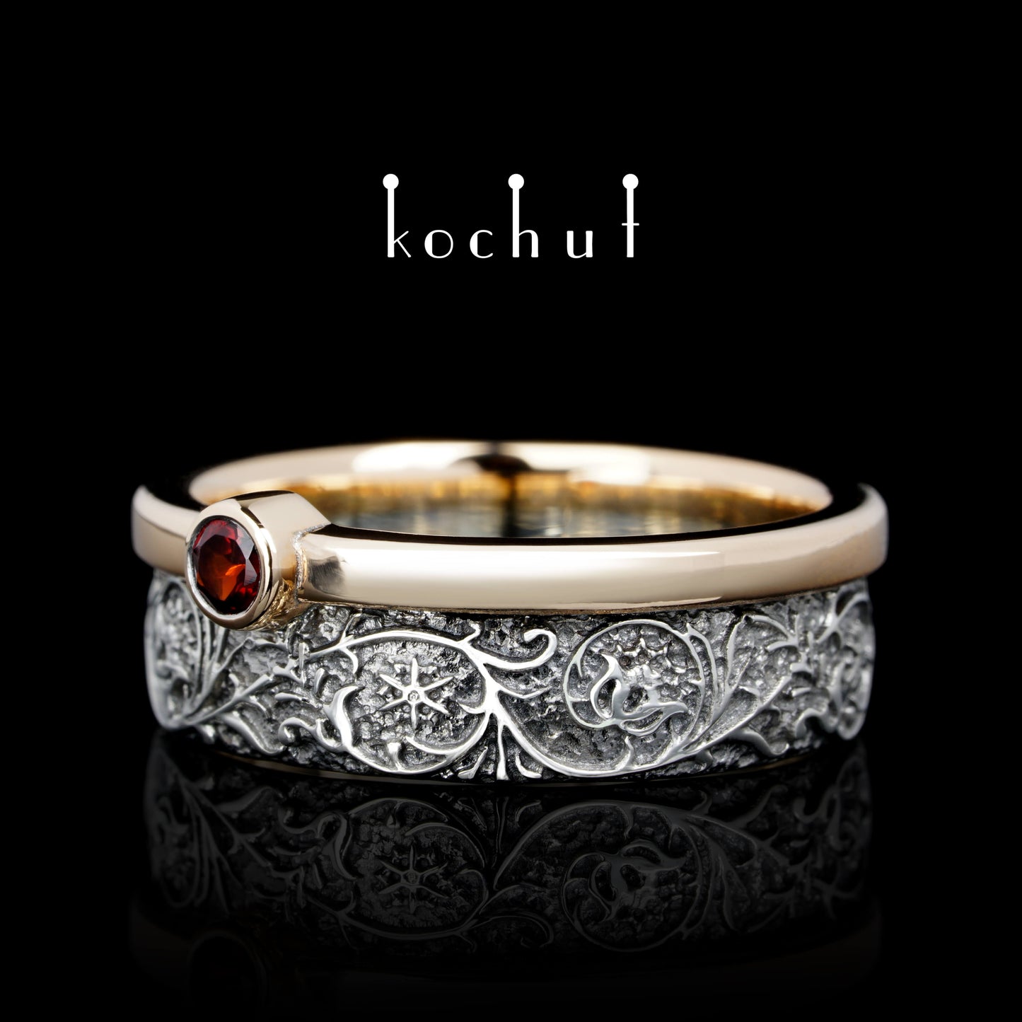 Harmonie der Natur — Ring aus Silber, Rotgold mit Granat, überzogen mit schwarzem Rhodium