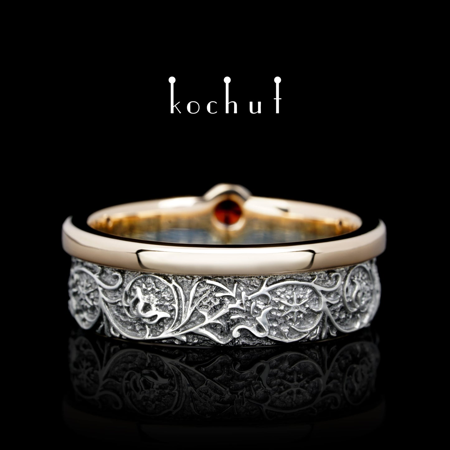 Harmonie der Natur — Ring aus Silber, Rotgold mit Granat, überzogen mit schwarzem Rhodium