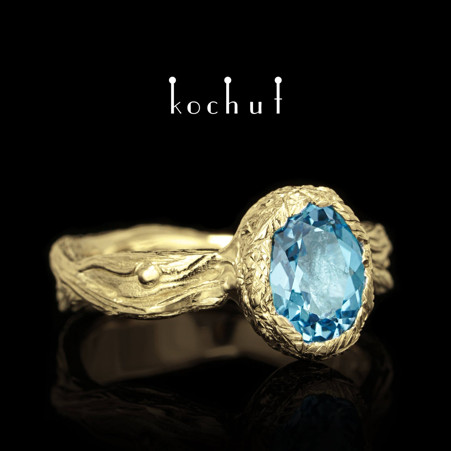 Quelle des Lebens — Ring aus Gelbgold mit einem Topas