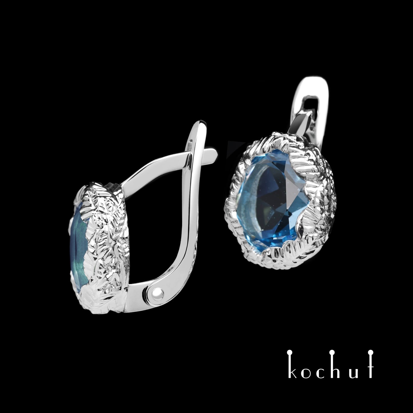 Quelle des Lebens — silberne Ohrringe mit Topas und Weißrhodium