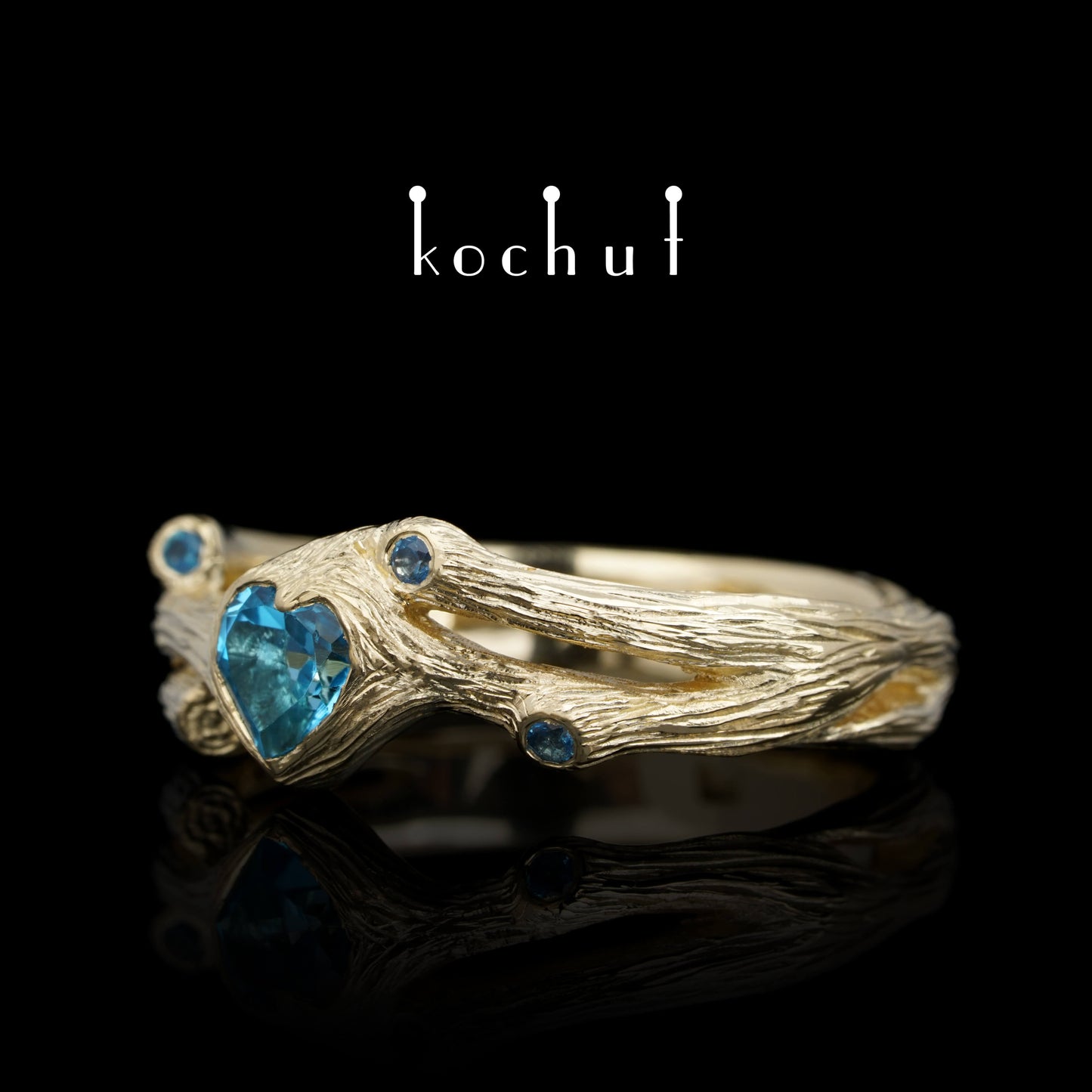 Herz des Waldes — Ring aus Gelbgold mit Topasen