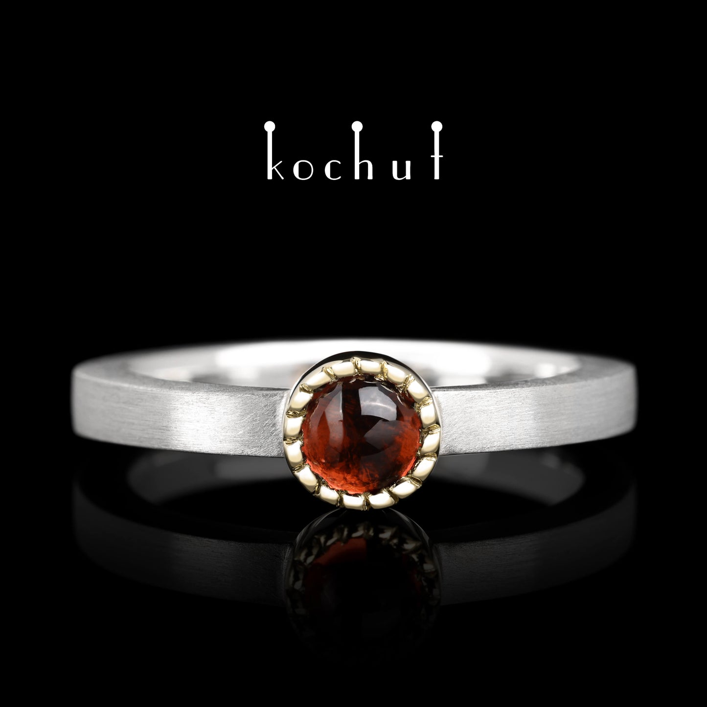 Mars — Ring aus Silber und Gelbgold mit einem Granat