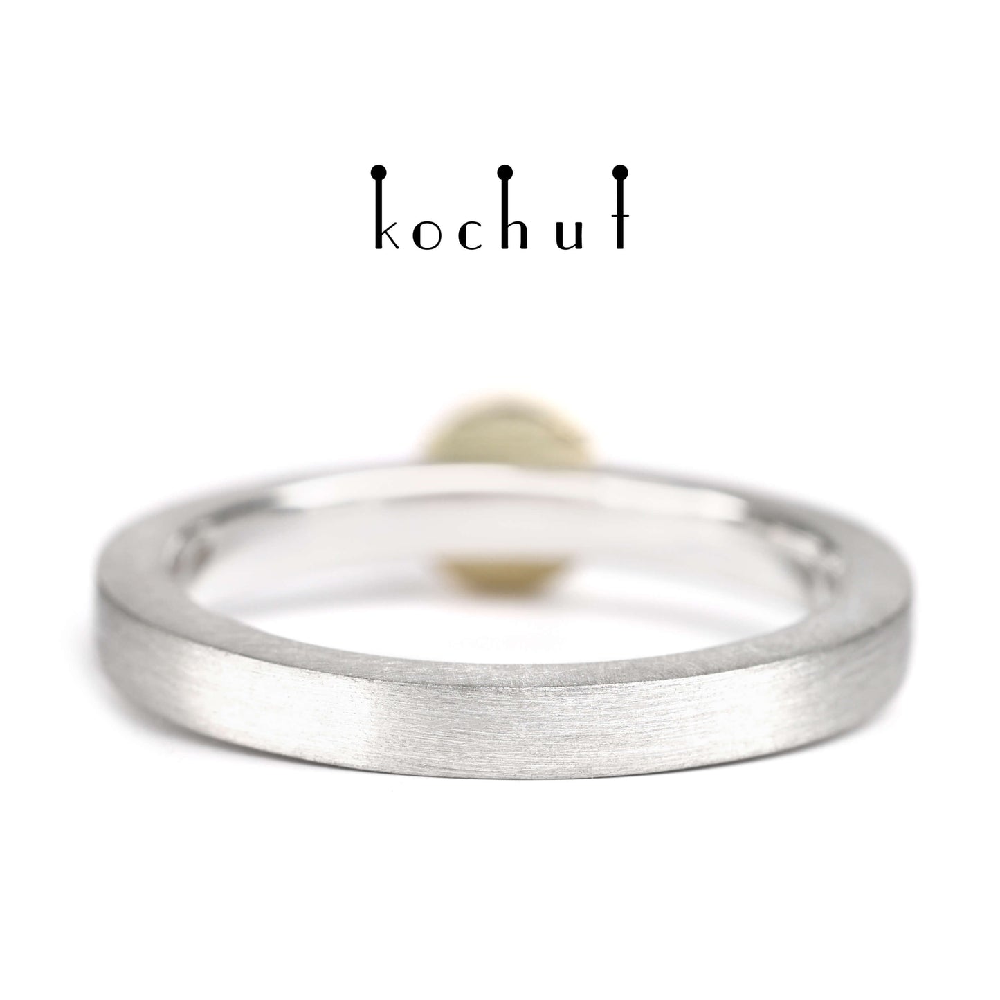 Mars — Ring aus Silber und Gelbgold mit einem Granat