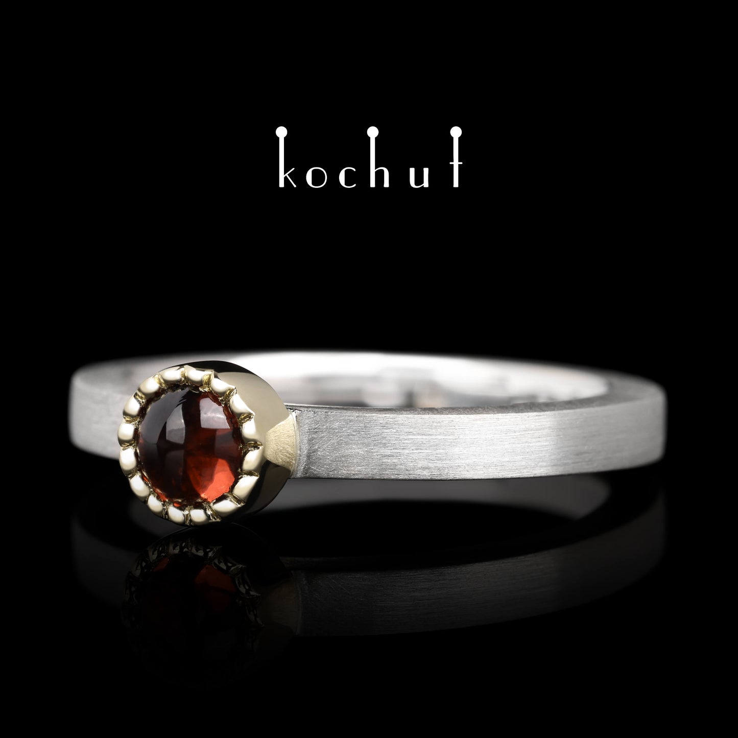 Mars — Ring aus Silber und Gelbgold mit einem Granat