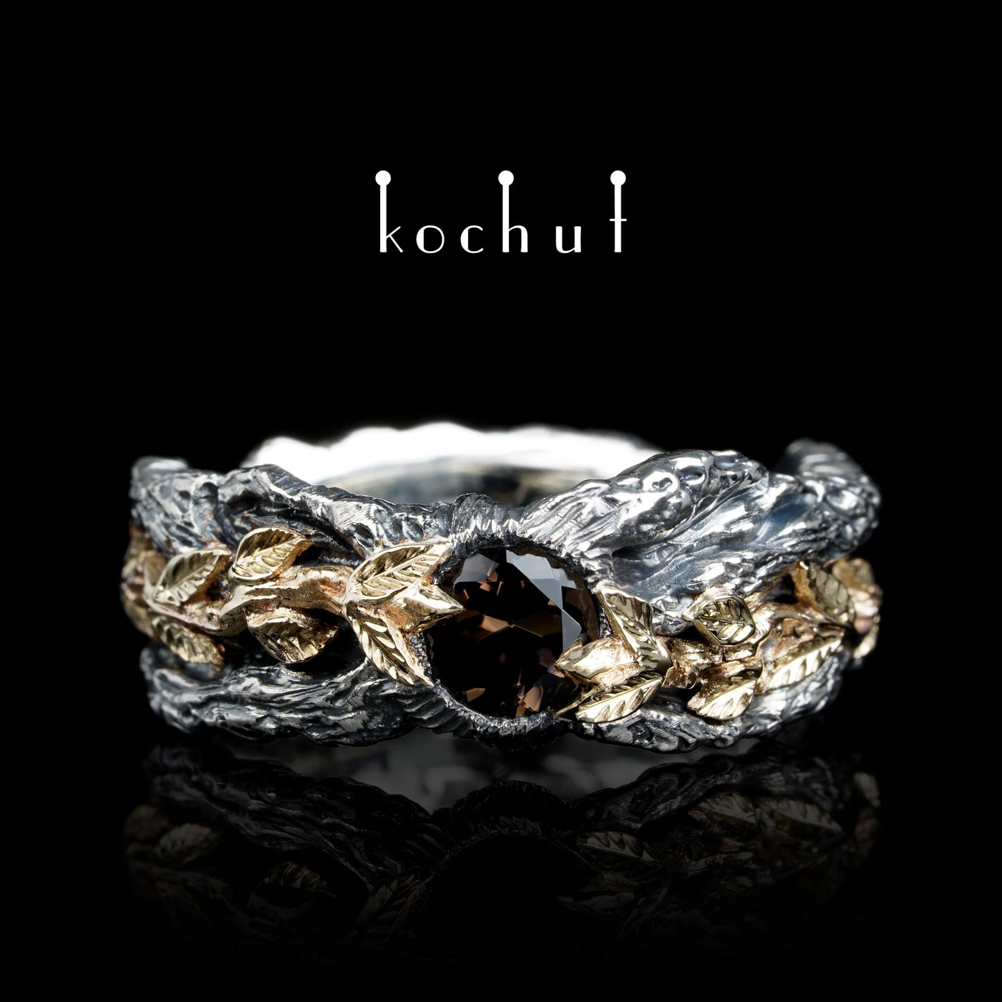 Kraft des Lebens — Ring aus oxidiertem Silber und Gelbgold mit Rauchquarz