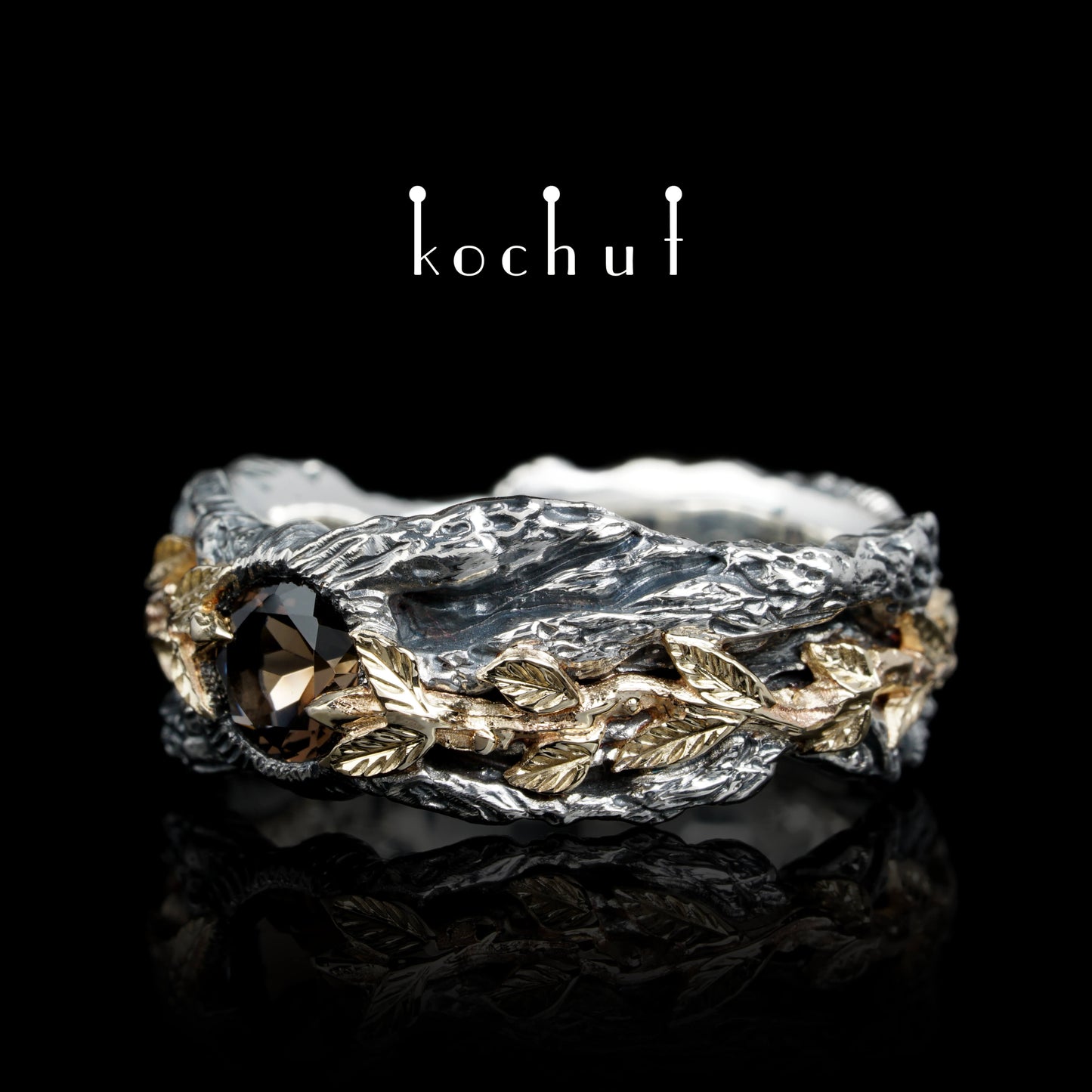 Kraft des Lebens — Ring aus oxidiertem Silber und Gelbgold mit Rauchquarz