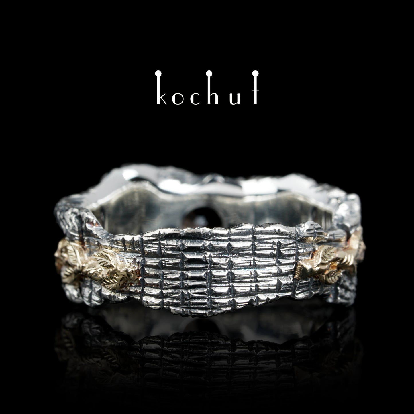 Kraft des Lebens — Ring aus oxidiertem Silber und Gelbgold mit Rauchquarz
