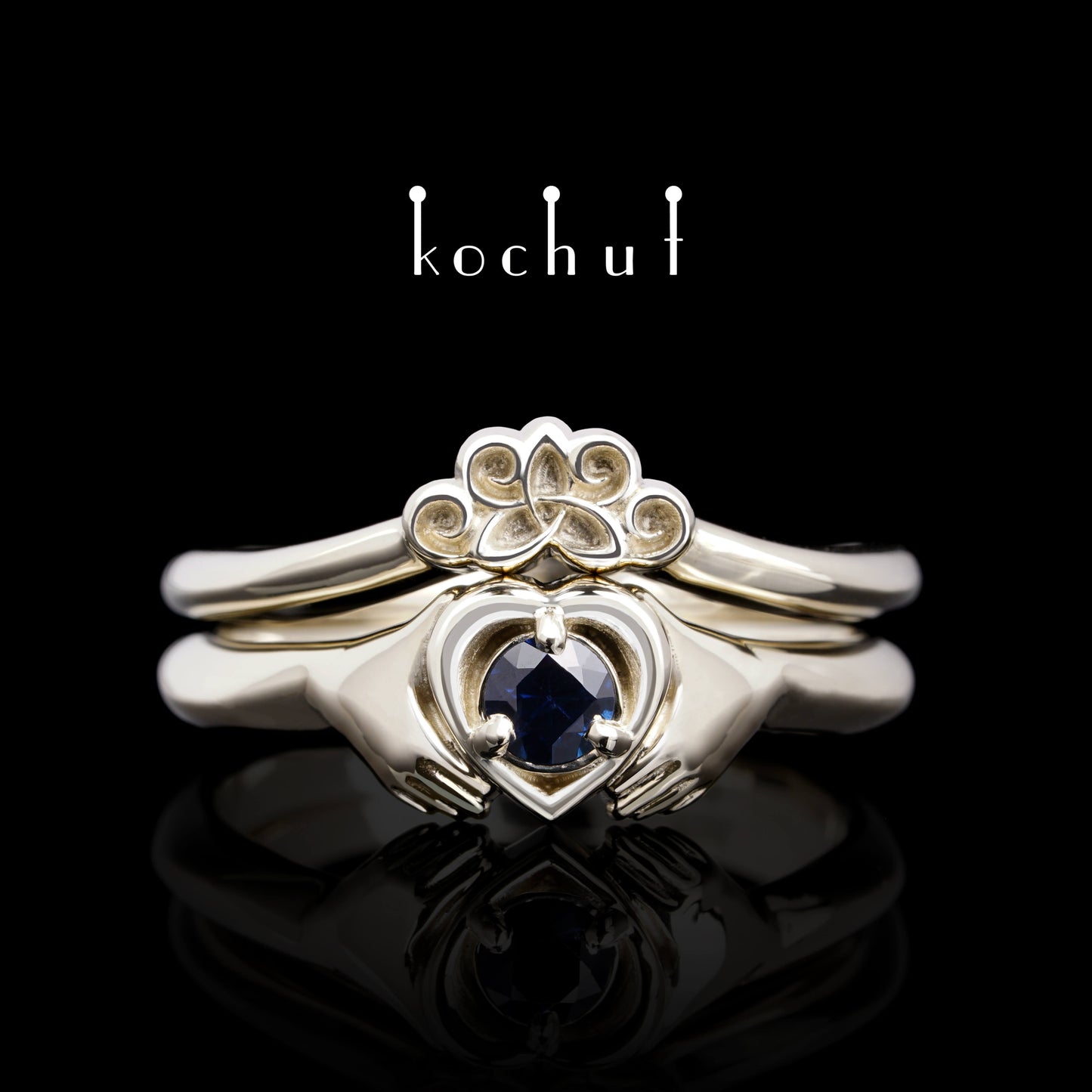 Claddagh: Doppelring aus Weißgold mit einem Saphir