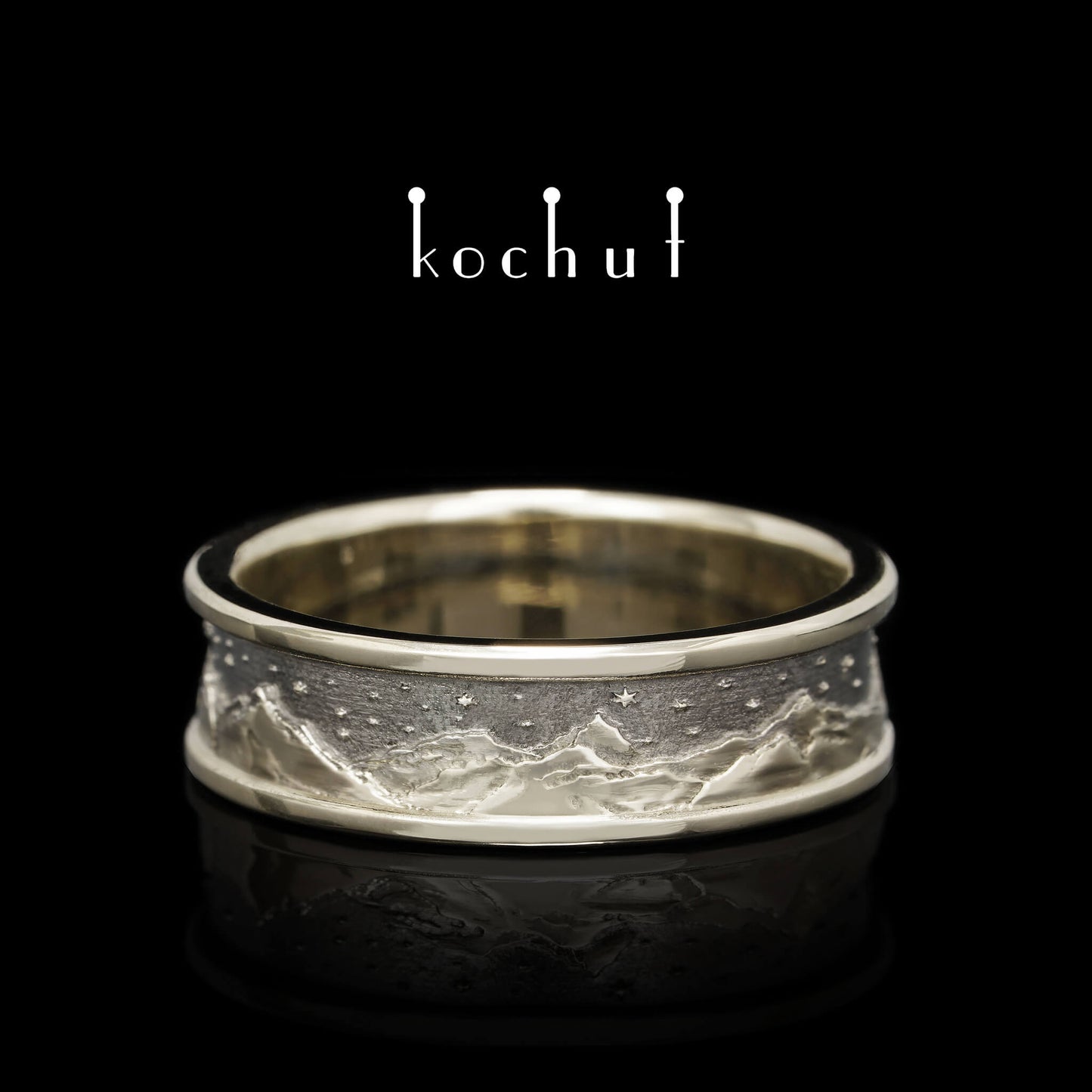 Höhen des Liebes: Sonne und Mond — goldener Ring mit schwarzem Rhodium
