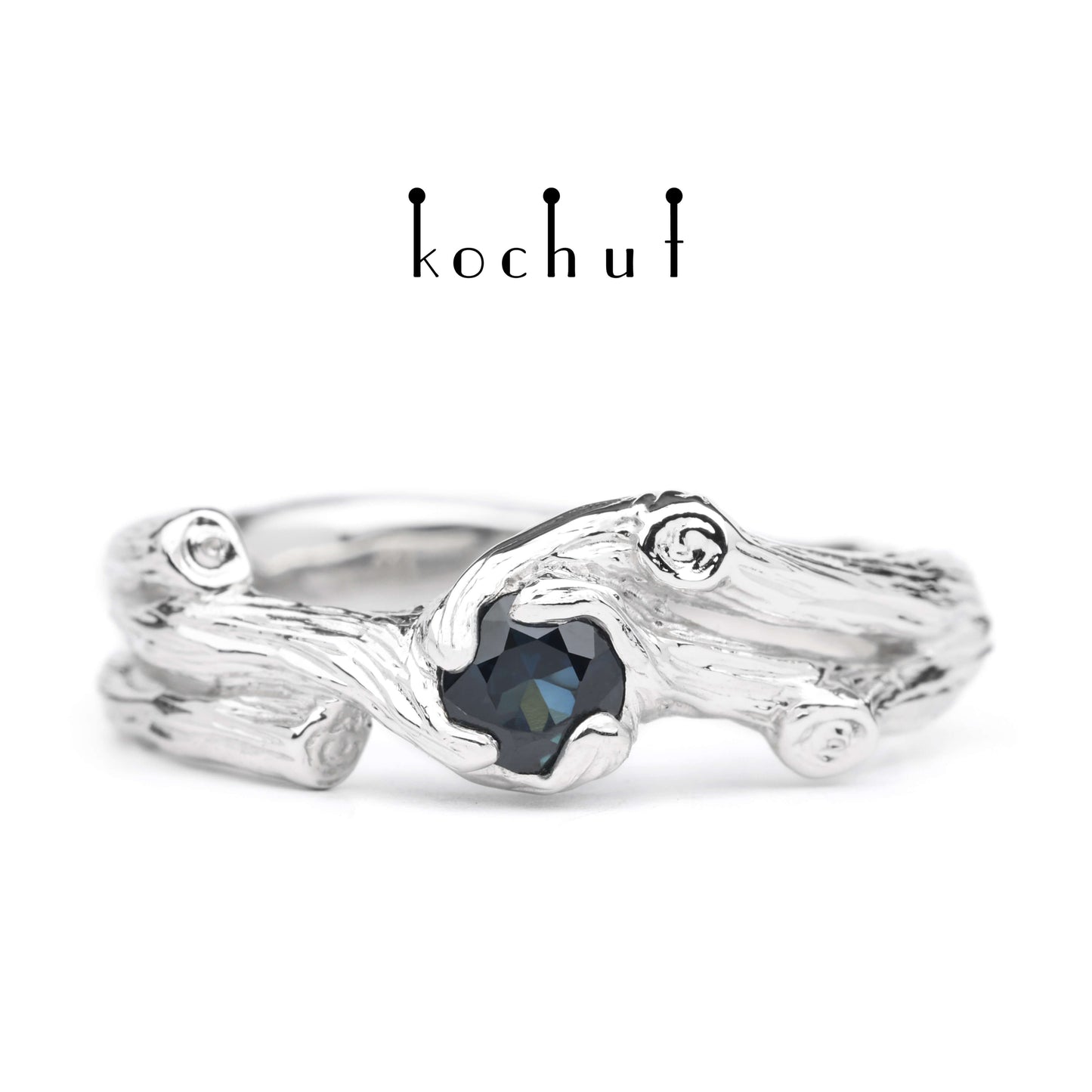 Zweig — Weißgoldring mit einem Saphir, bedeckt mit weißem Rhodium