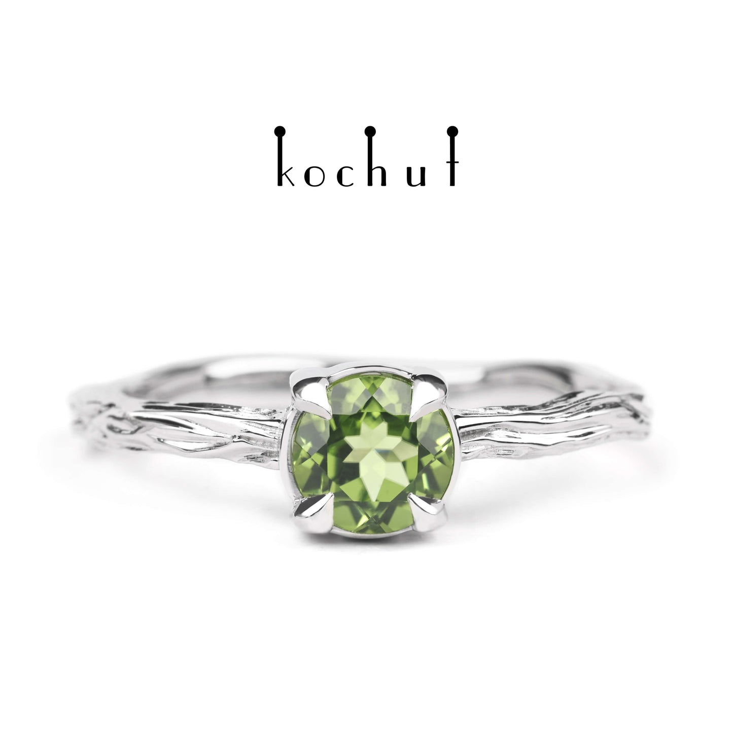 Winterzweig — silberner Ring mit einem Chrysolith, beschichtet mit weißem Rhodium