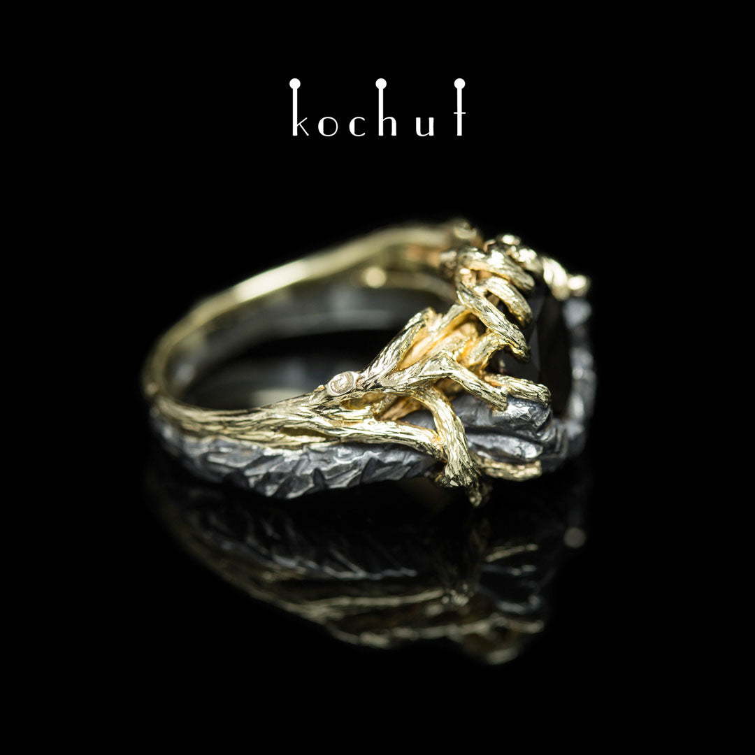Dominant — Ring aus oxidiertem Silber und Gelbgold mit Rauchquarz