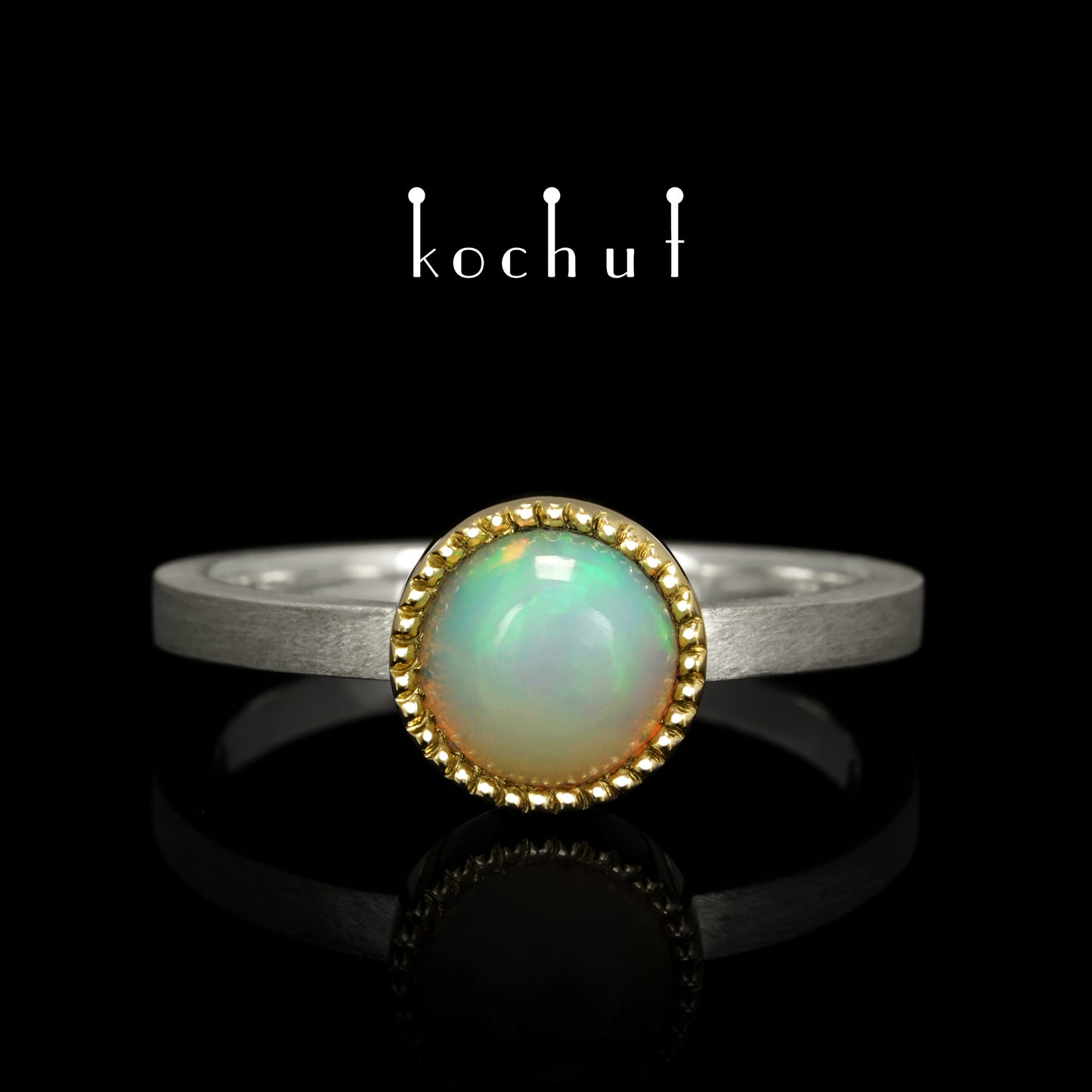 Jupiter — ein Ring aus Silber, Gelbgold und Opal
