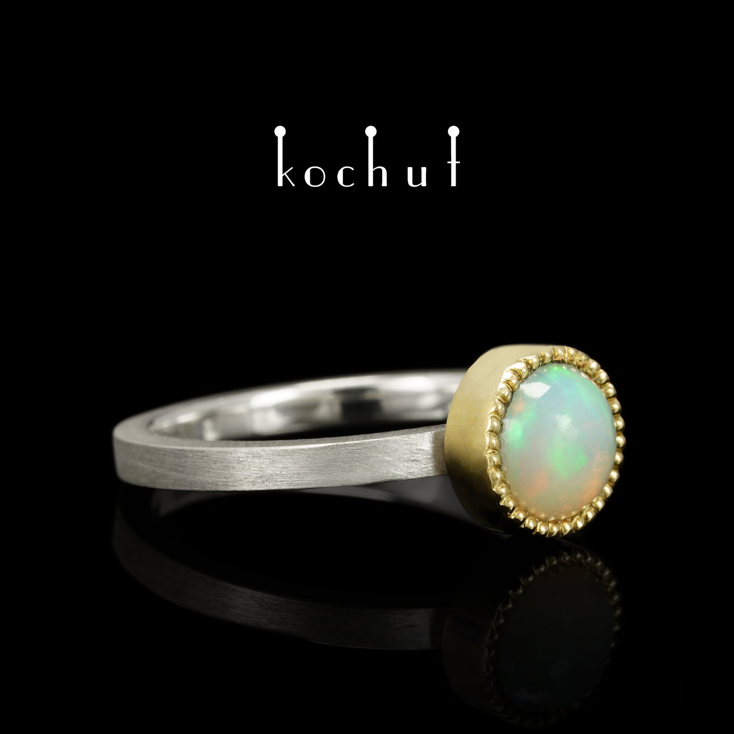 Jupiter — ein Ring aus Silber, Gelbgold und Opal