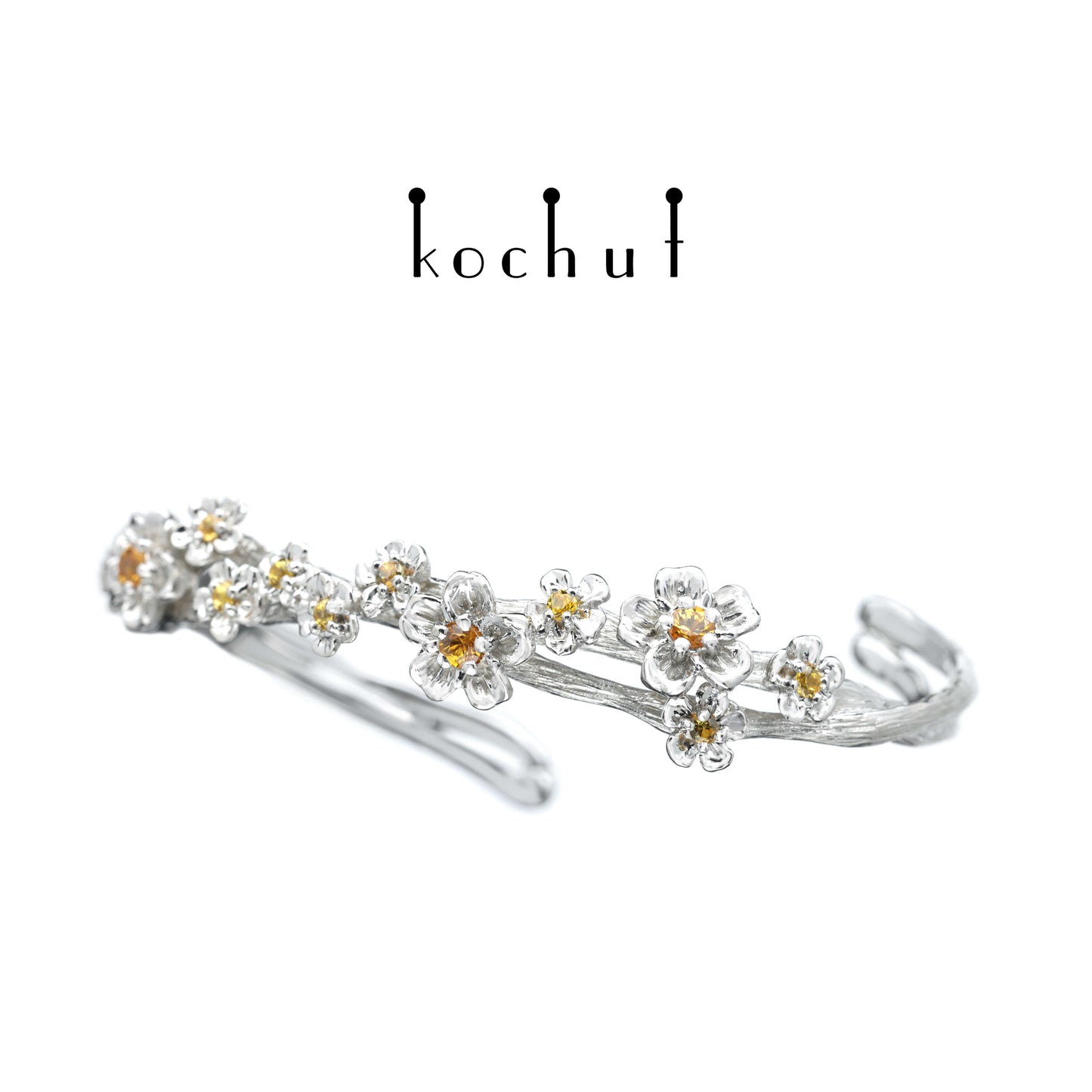 Blumenkrone — ein silbernes Armband mit Weißrhodium-Beschichtung und Saphiren