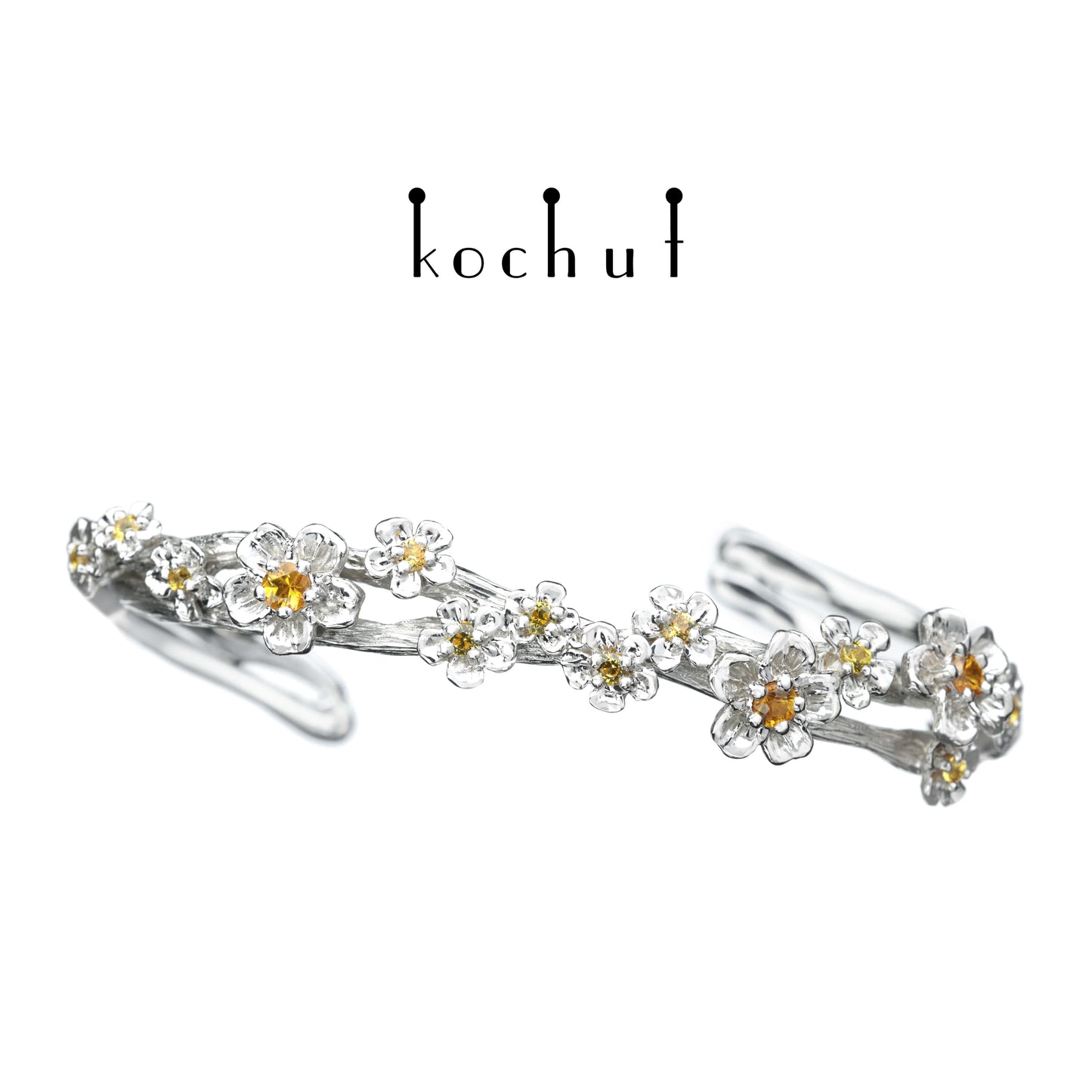 Blumenkrone — ein silbernes Armband mit Weißrhodium-Beschichtung und Saphiren