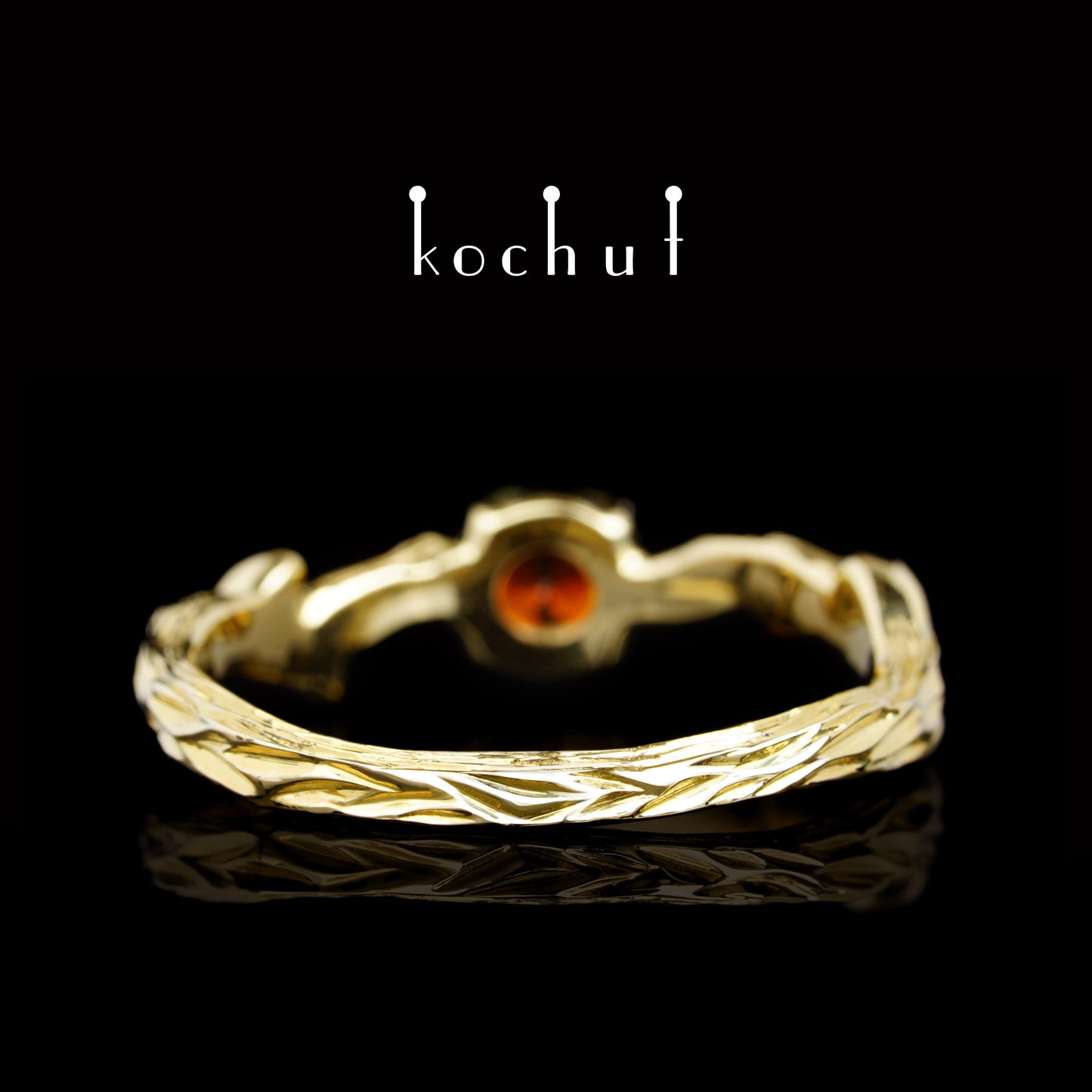 März-Zweig — Ring aus Gelbgold mit Granat