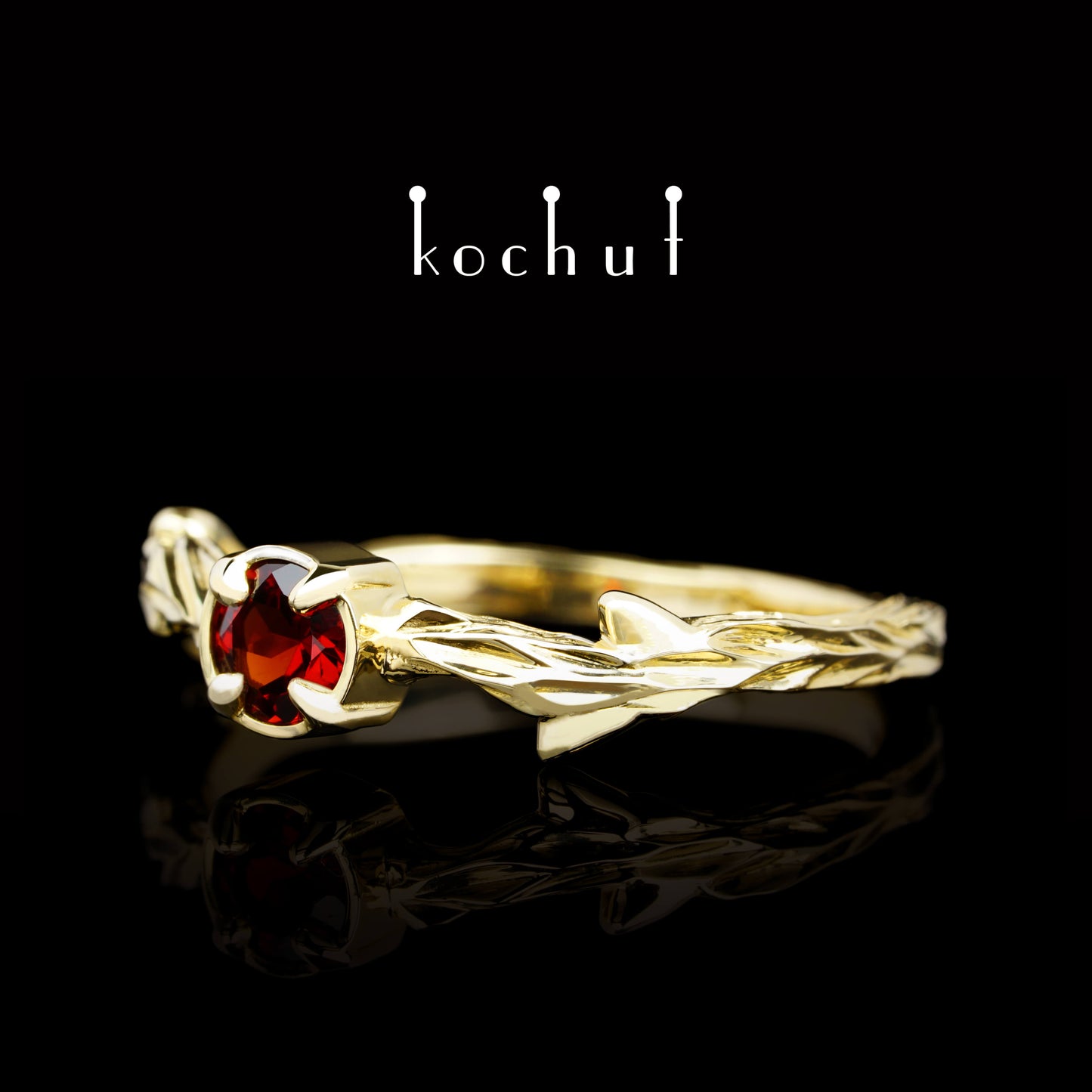 März-Zweig — Ring aus Gelbgold mit Granat