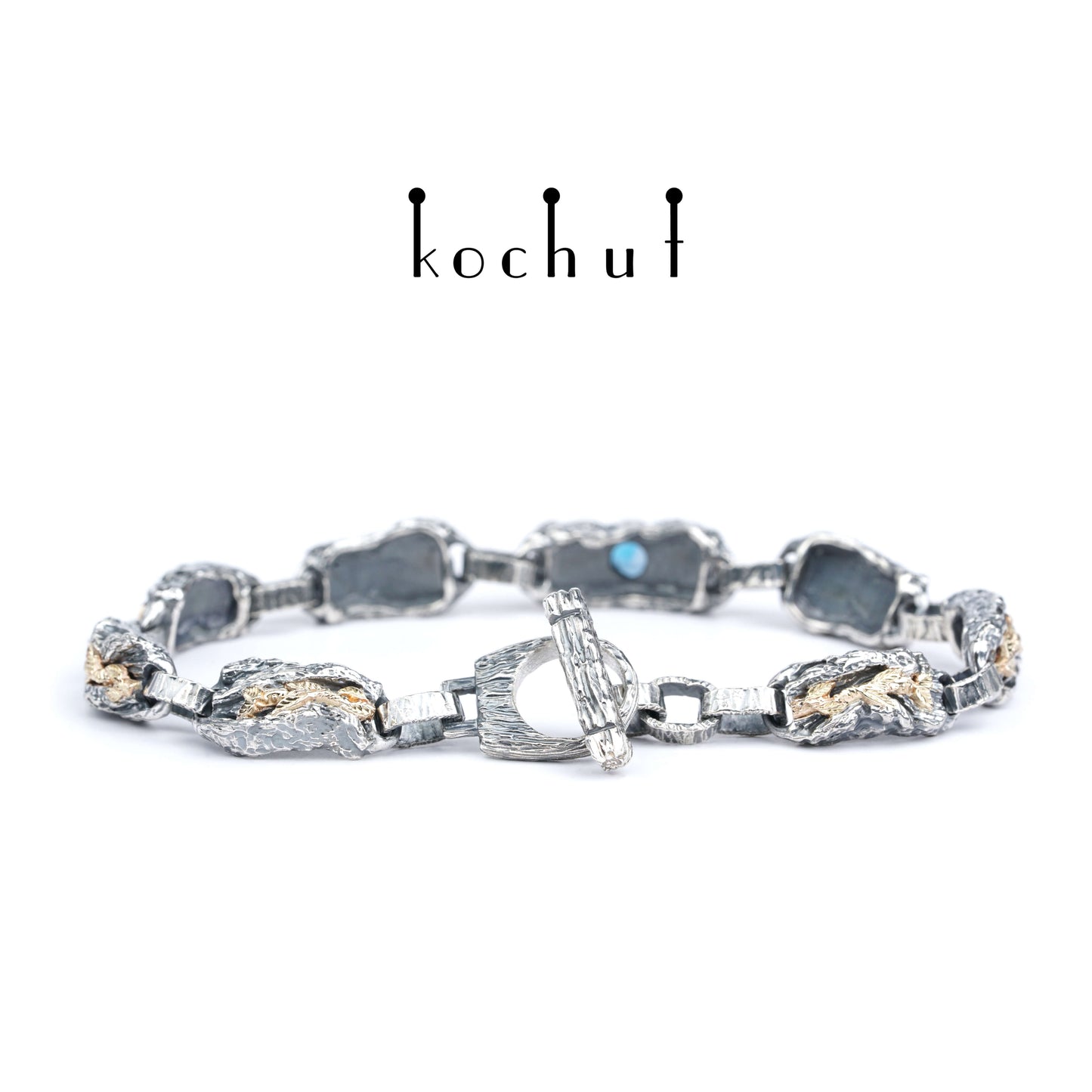 Kraft des Lebens — Armband aus oxidiertem Silber und Gelbgold mit Topas