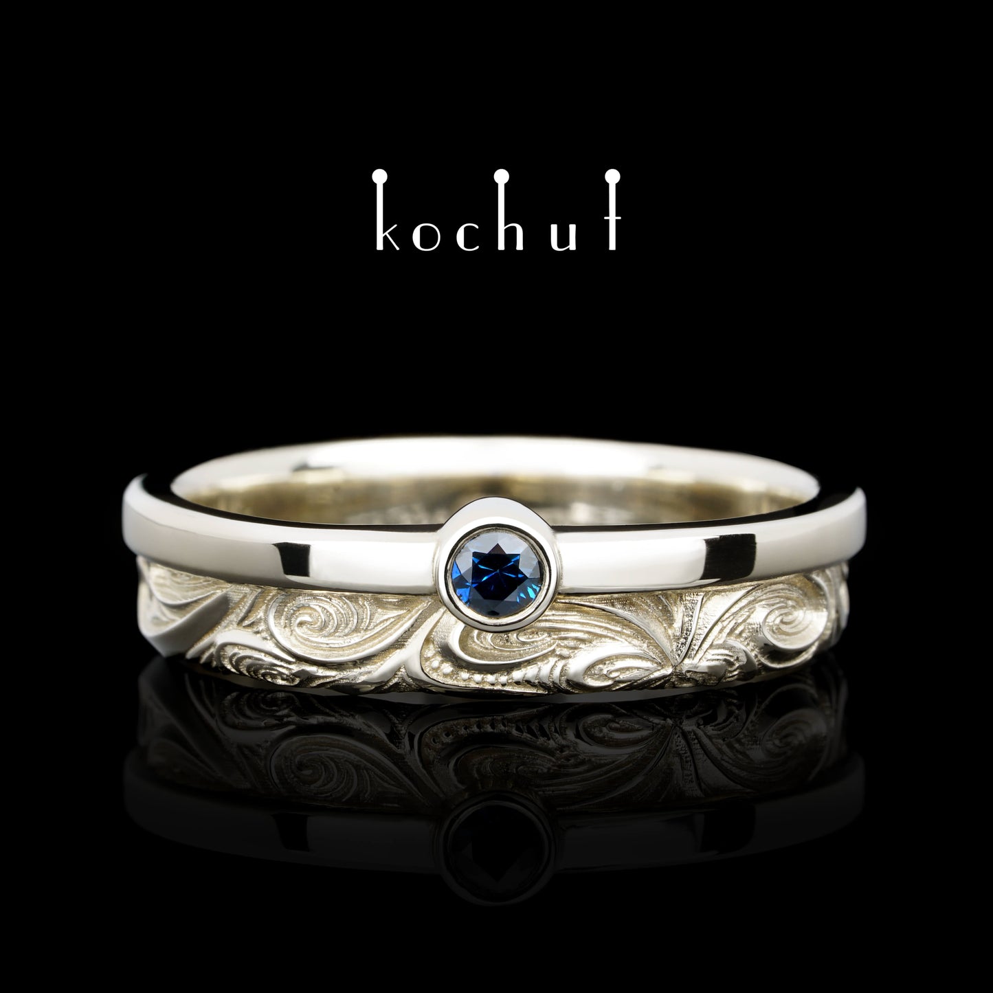 In Freude und Leid: Halbe — Ring aus Weißgold mit Saphir