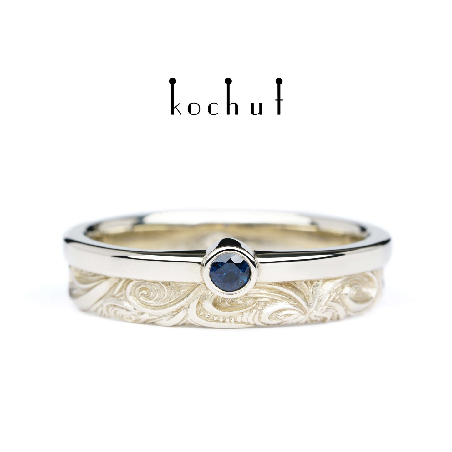 In Freude und Leid: Halbe — Ring aus Weißgold mit Saphir