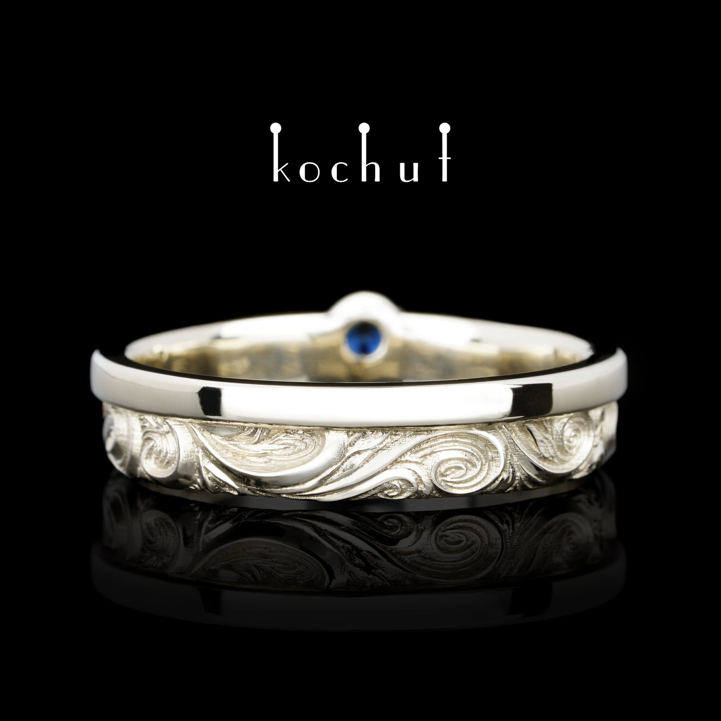 In Freude und Leid: Halbe — Ring aus Weißgold mit Saphir